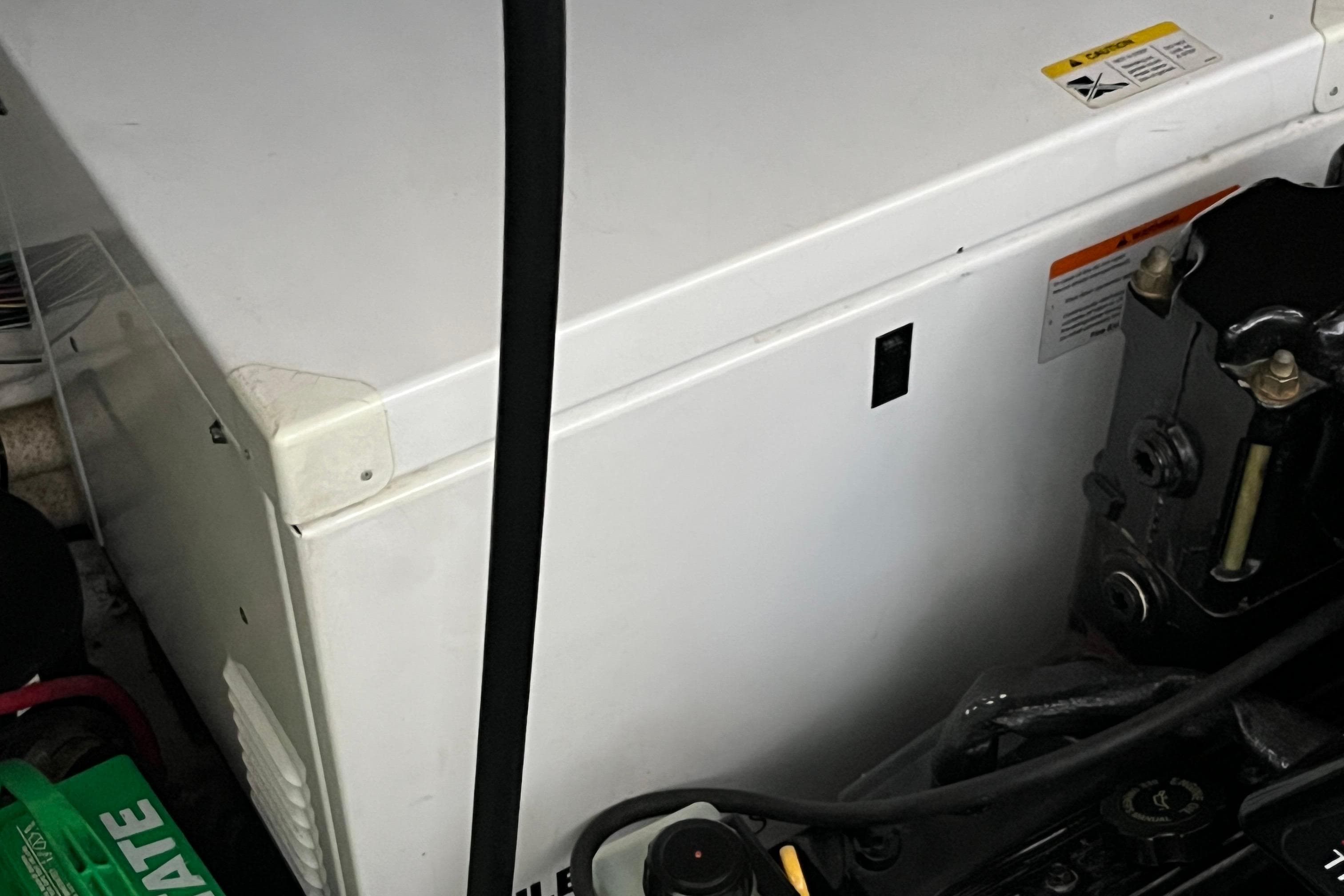 Engine compartment of a 2000 Maxum 3300 SCR boat, showing machinery and components.