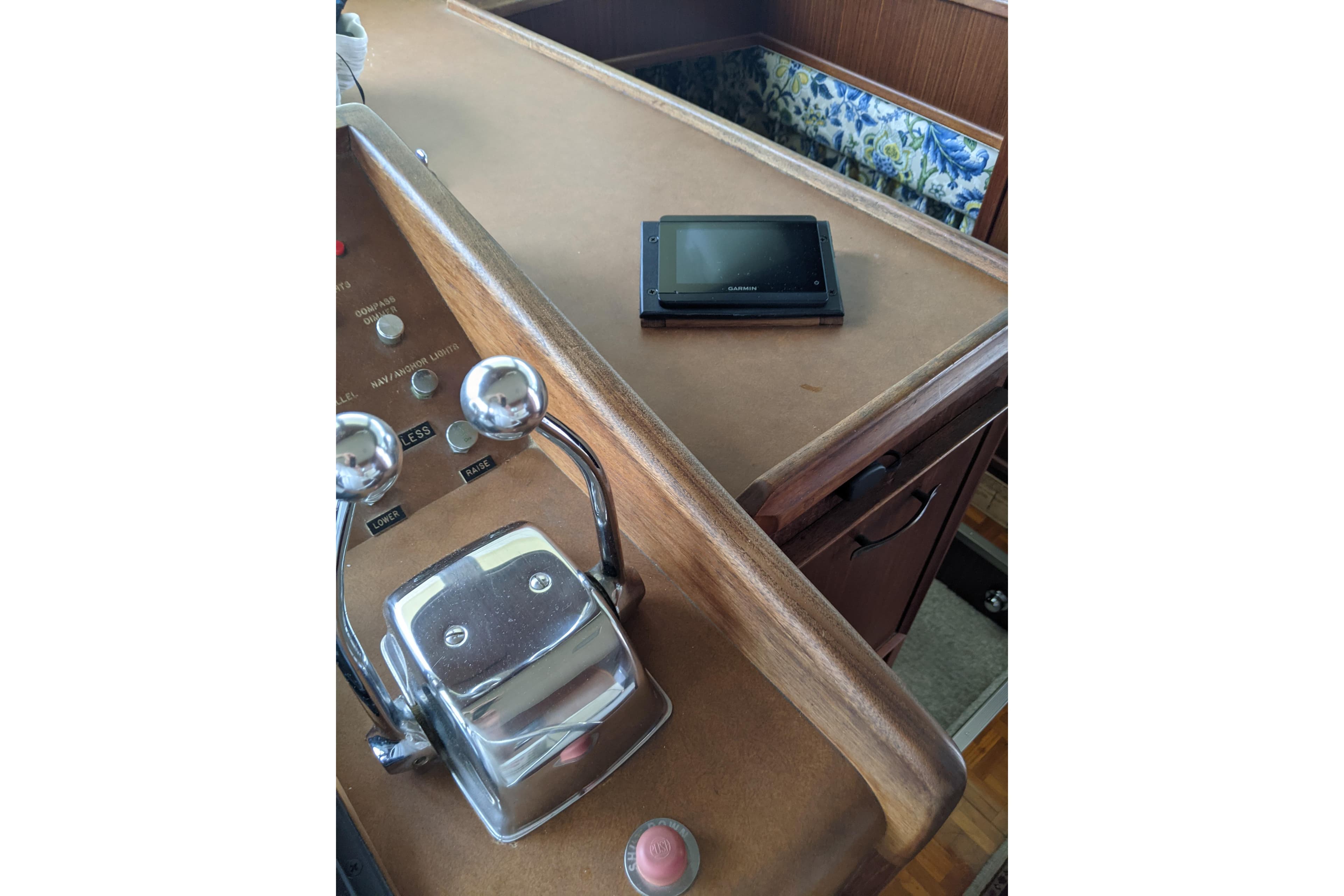 Control panel of 1984 Hatteras 53 Motor Yacht with navigation equipment.