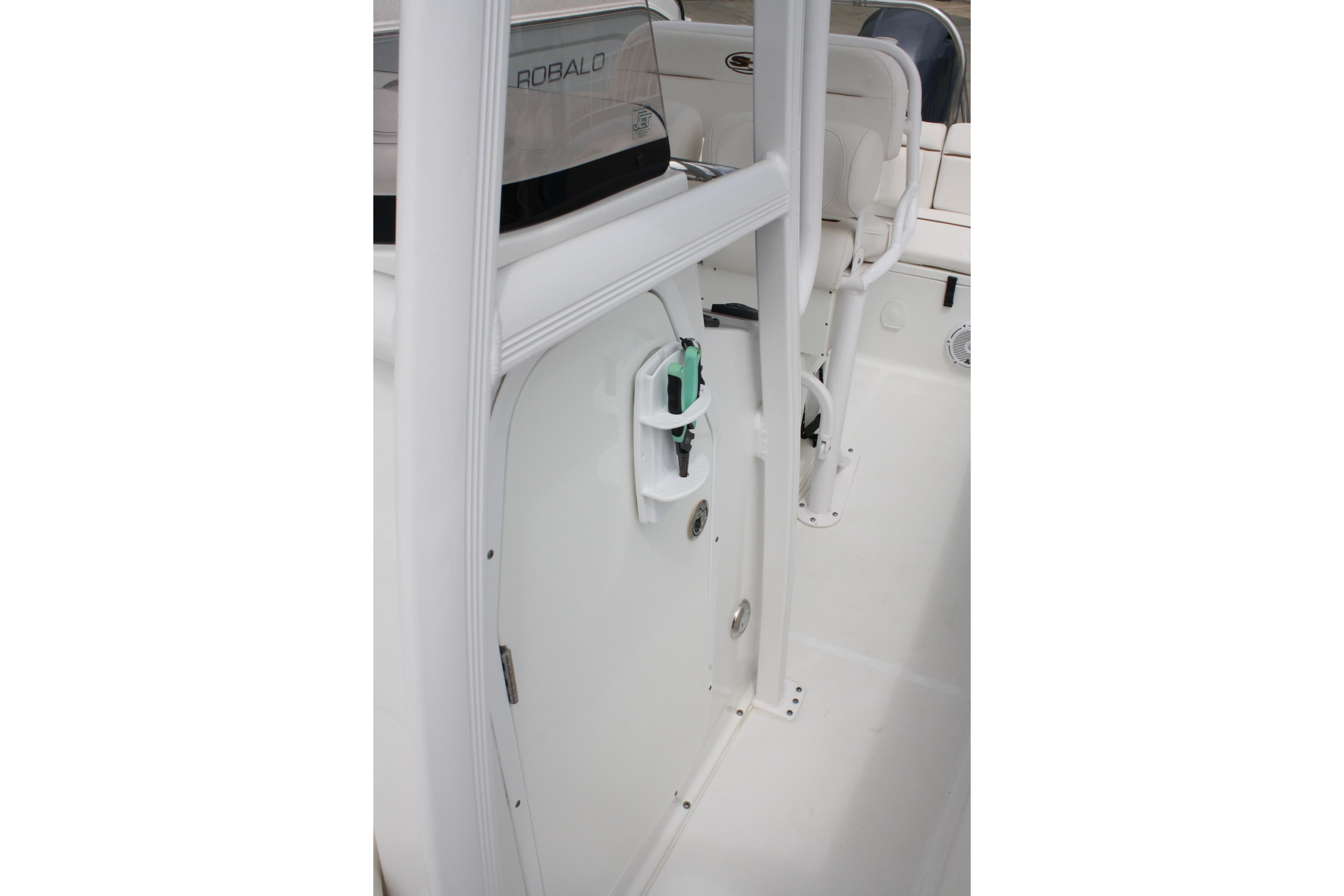 2022 Sea Hunt Ultra 219 boat interior, featuring sleek white design and modern amenities.