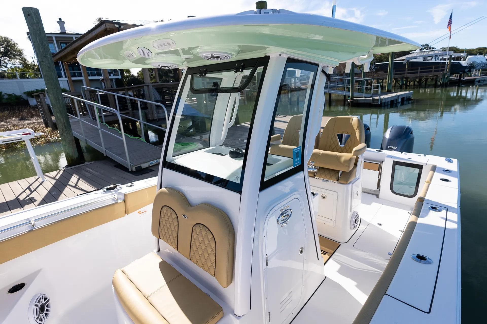 Manufacturer Provided Image: 2025 Sportsman Open 262 Center Console boat docked at marina.