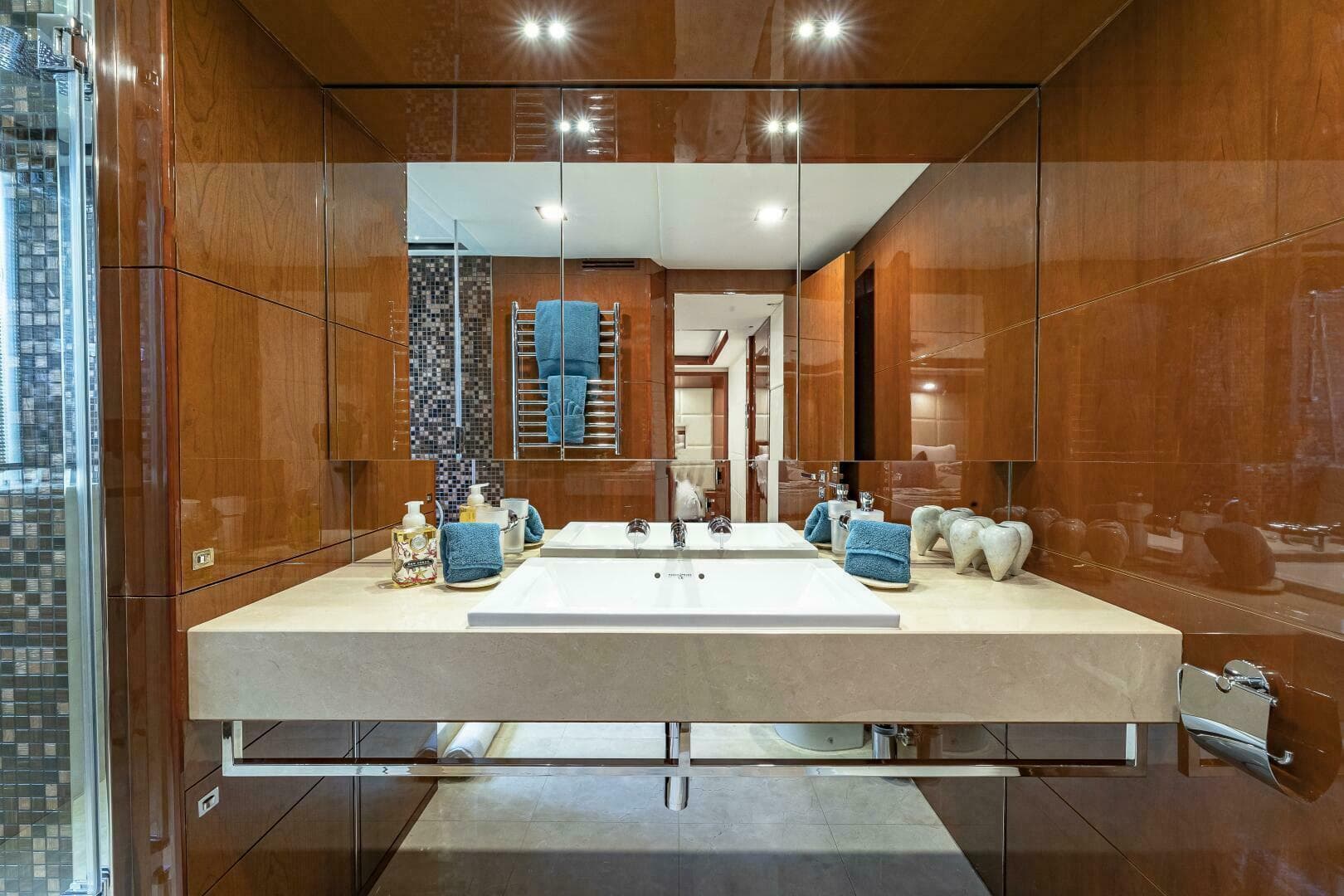 Luxurious bathroom in a 2012 Princess 32M yacht with modern fixtures and elegant design.