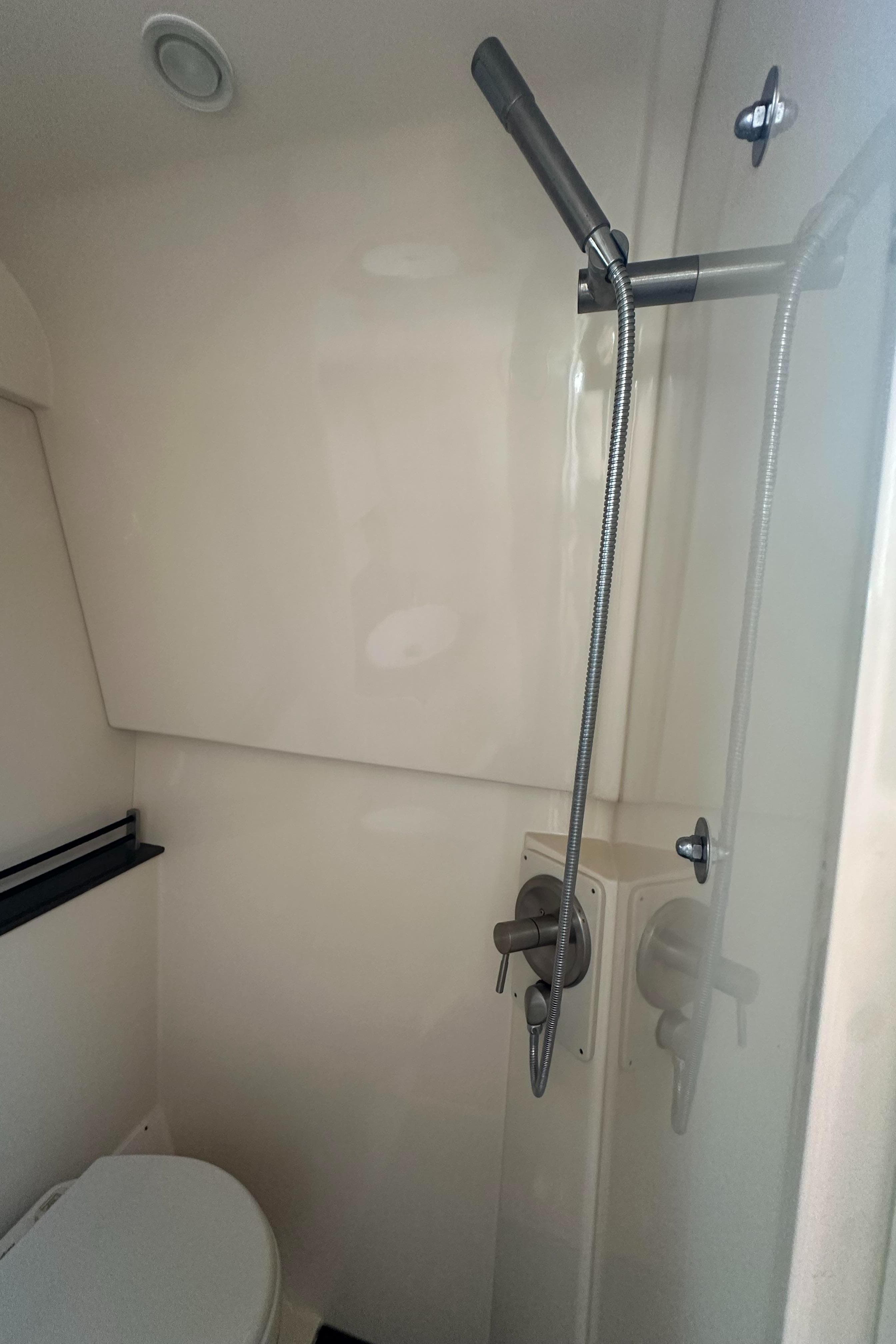 Shower area in 2013 Sea Ray 370 Venture boat, featuring modern fixtures and compact design.