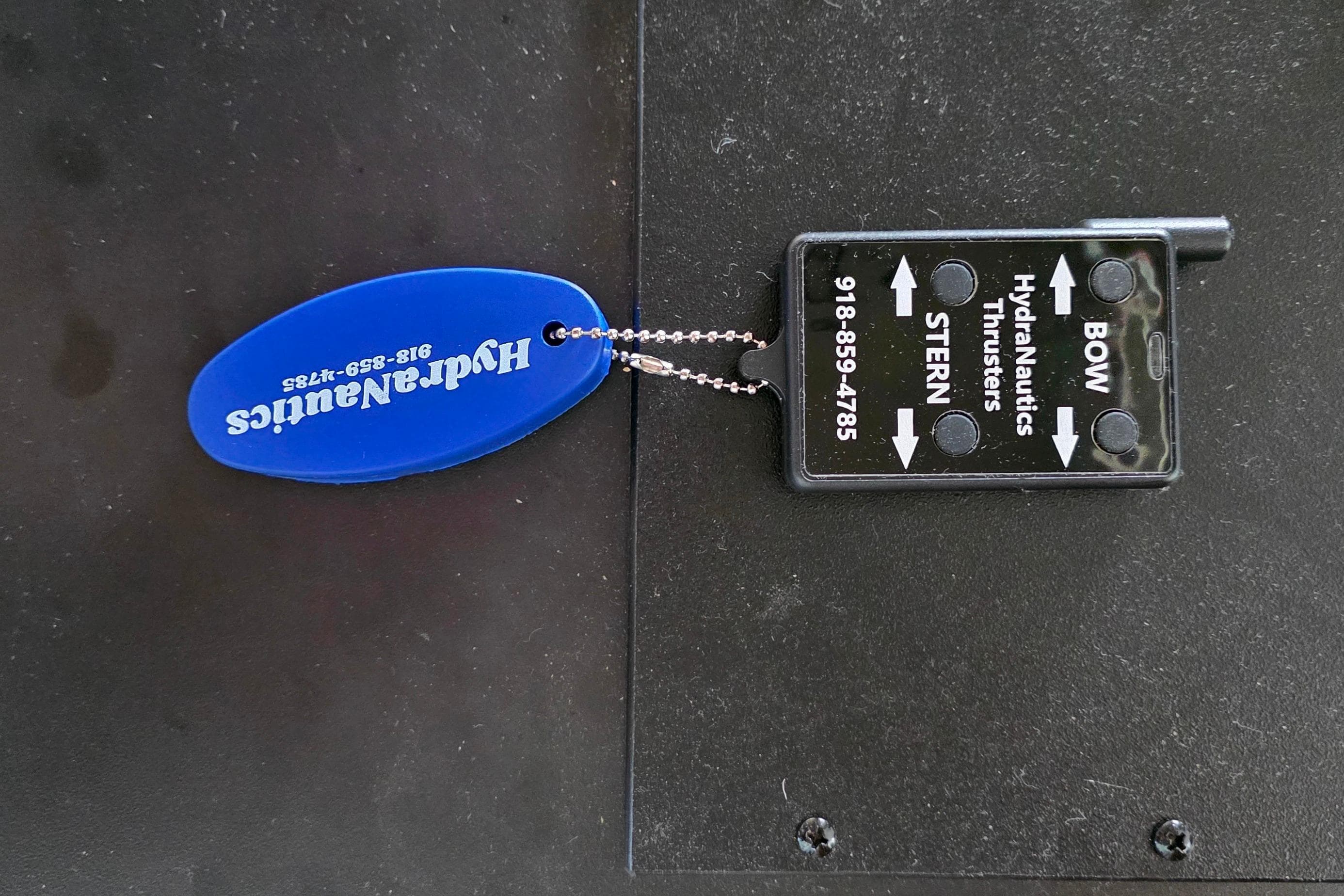 Remote control for HydraNautics thrusters with keychain, Stardust Cruisers 16x60, 1999 model.