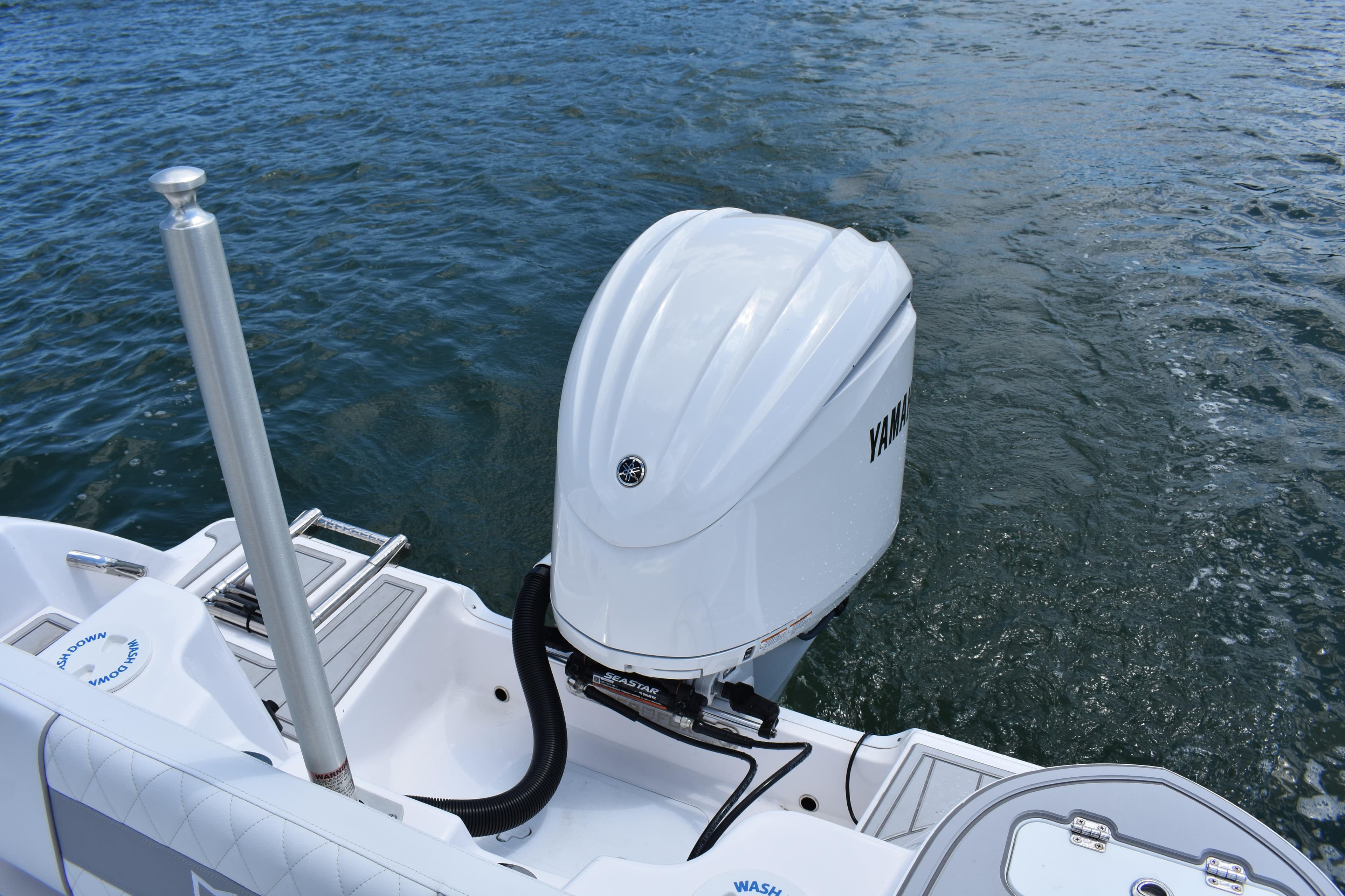 2026 Sea Fox 248 Commander boat with Yamaha outboard engine on water.