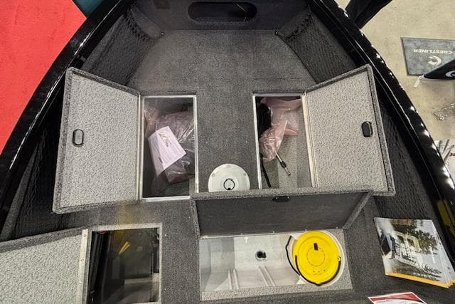 Interior view of 2026 Crestliner 1850 Kodiak WT boat storage compartments.