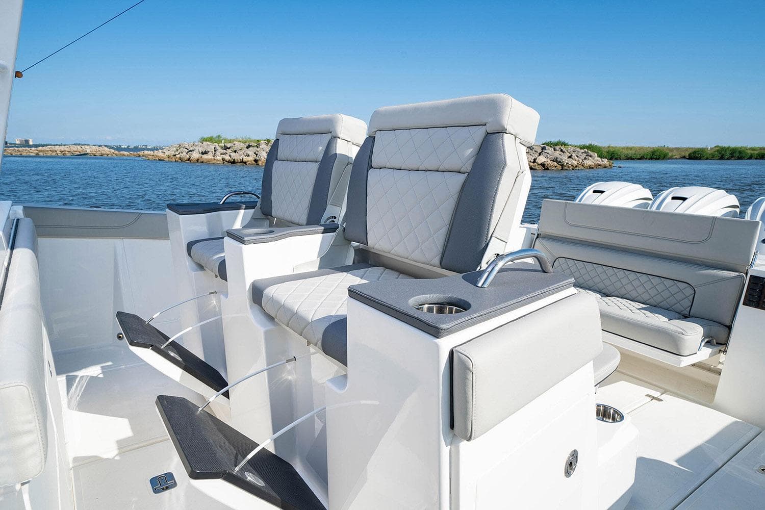Manufacturer Provided Image: 2025 Pursuit S 428 Sport boat interior with luxurious seating and ocean view.