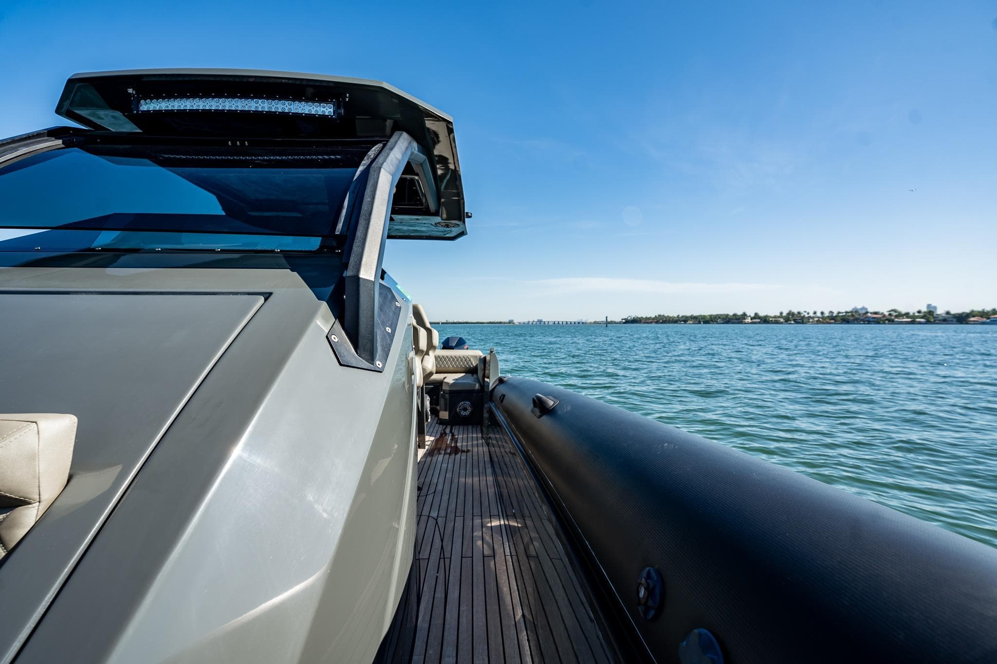 2023 Skipper-BSK 38NC luxury boat cruising on a sunny day.
