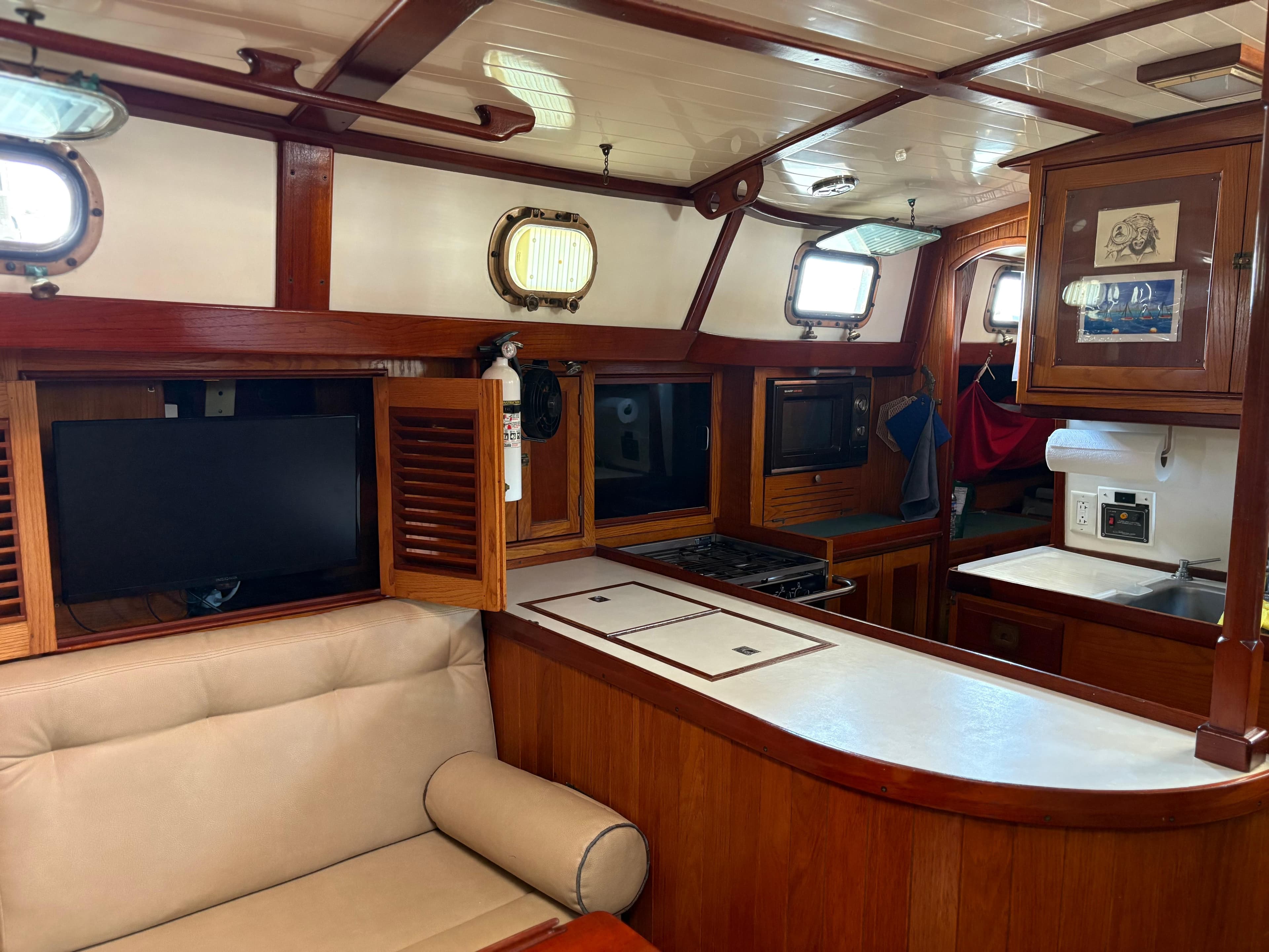 Interior of 1984 Shannon Aegean 51 yacht with wood finish and modern amenities.