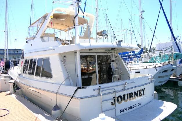 1999 Hampton 490 Pilothouse yacht docked in San Diego marina.