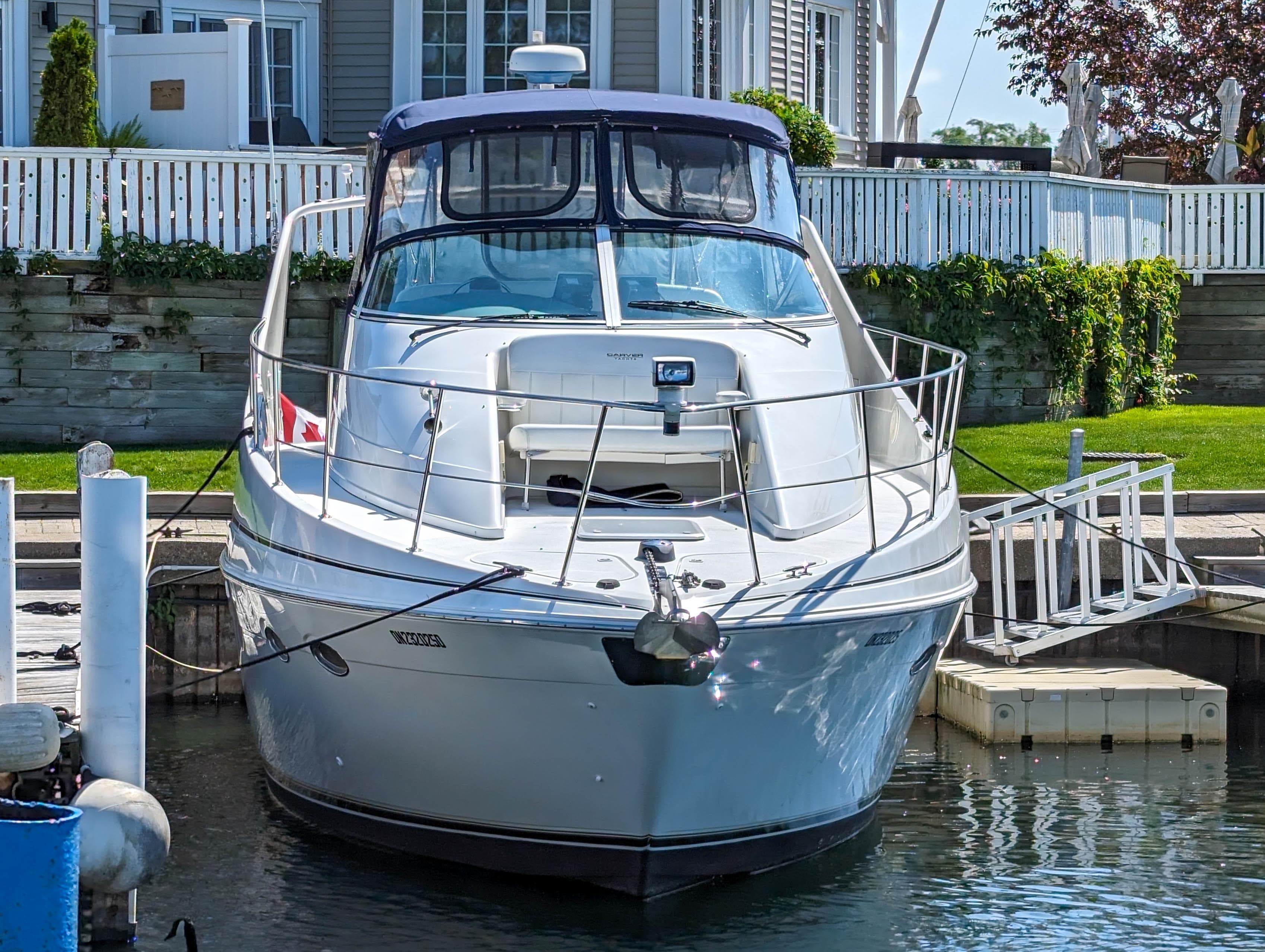Carver 350 Mariner 2000 at dock, front view.