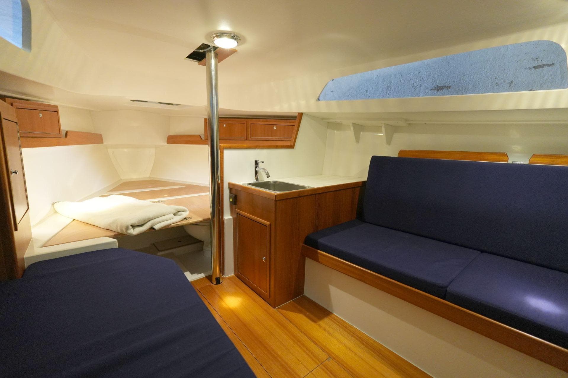 Interior of 2022 Saffier SC 8M Cabin with cozy seating and kitchenette.