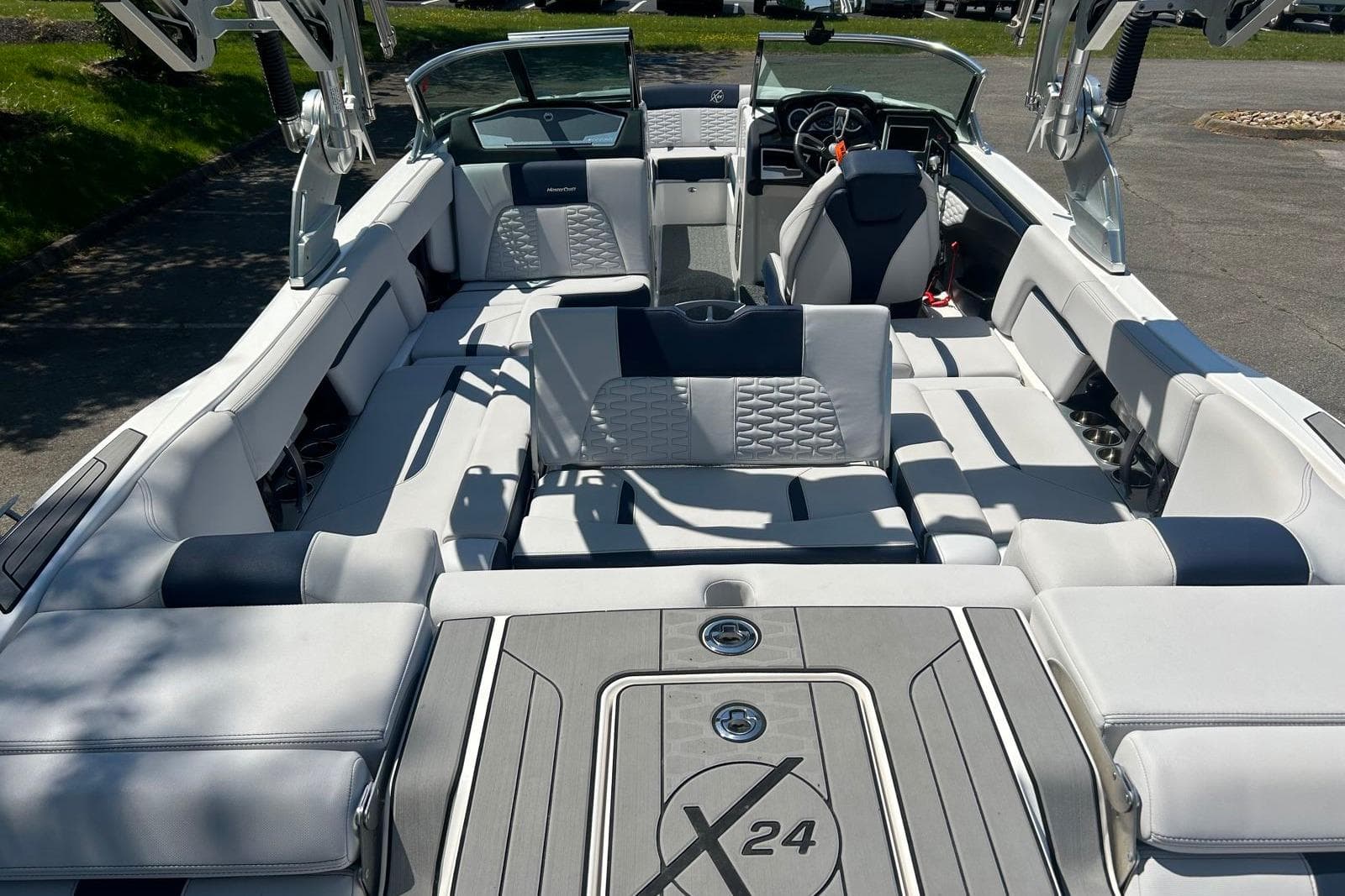 2021 MasterCraft X24 boat interior with luxurious seating and modern design.