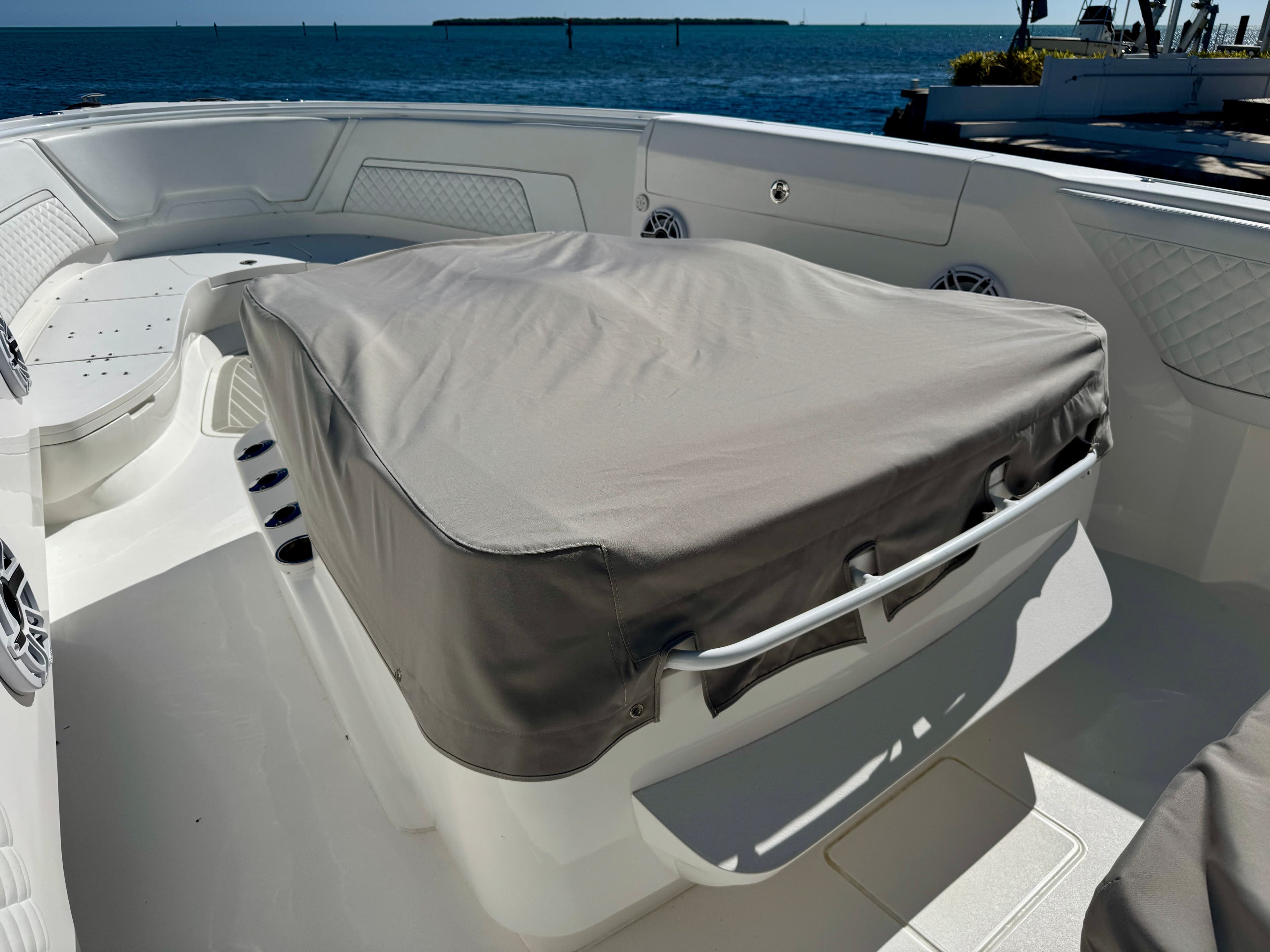 Intrepid 407 Nomad FE 2024 with cover on deck.