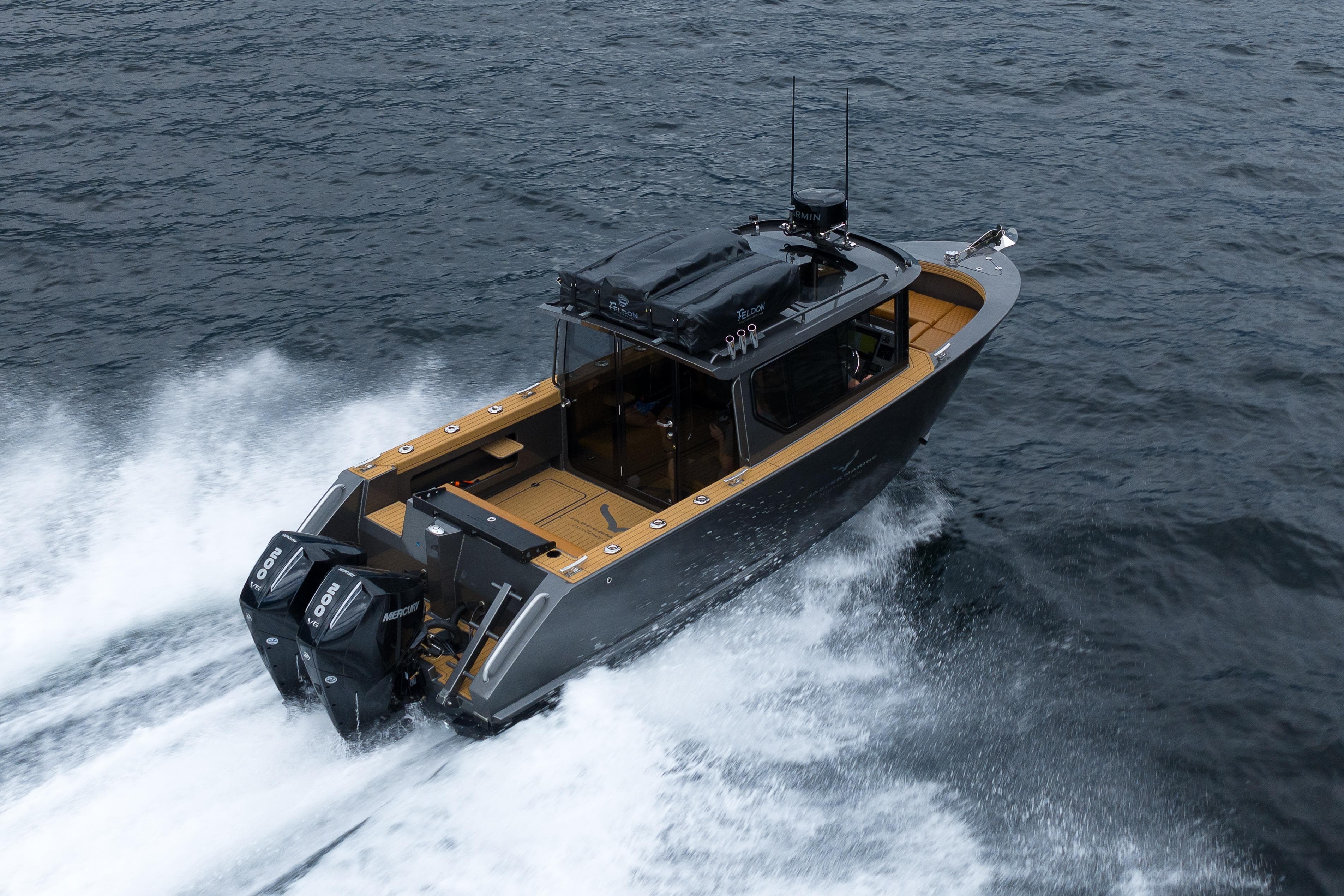 2026 Jasper Marine Defender 22 cruising on water.