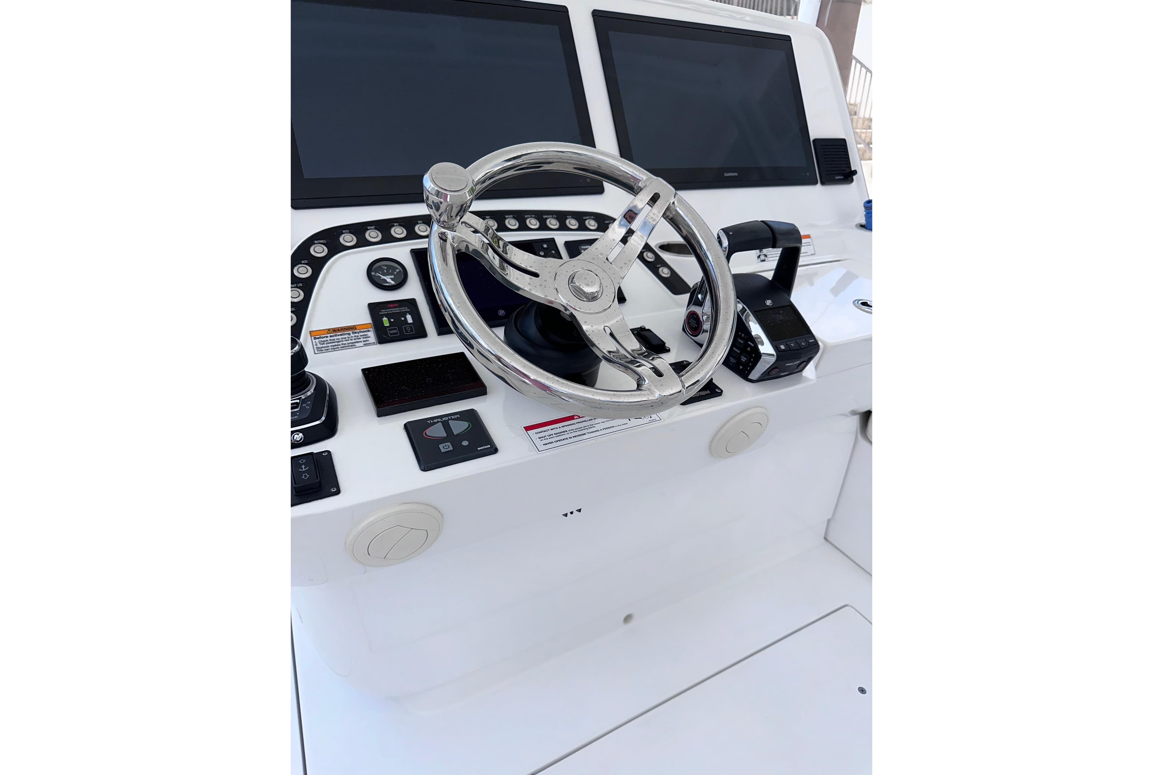 2024 Intrepid 41 Valor helm with dual screens and modern controls.