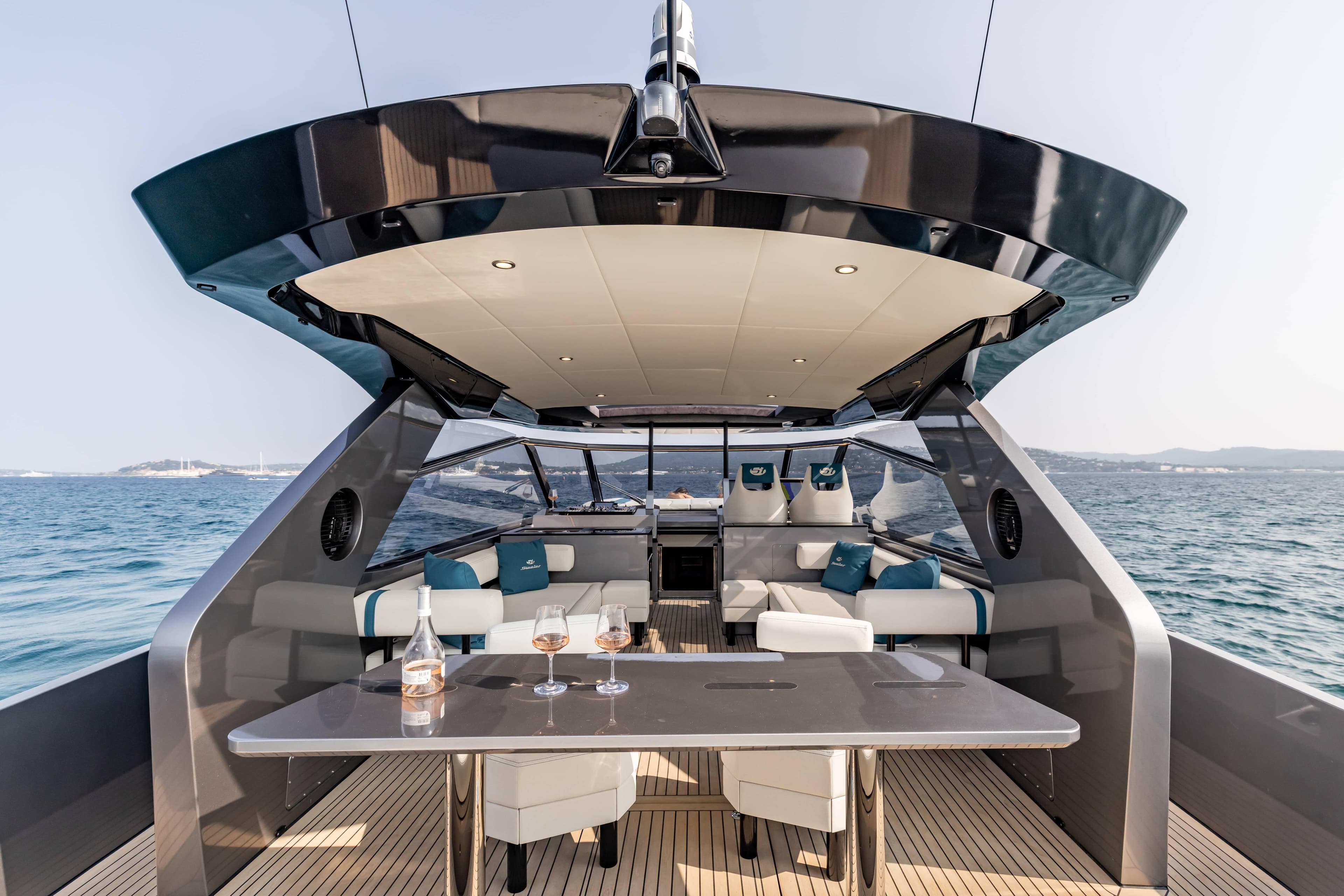 Luxurious 2025 Steeler Bronson 65 yacht interior with elegant seating and ocean view.