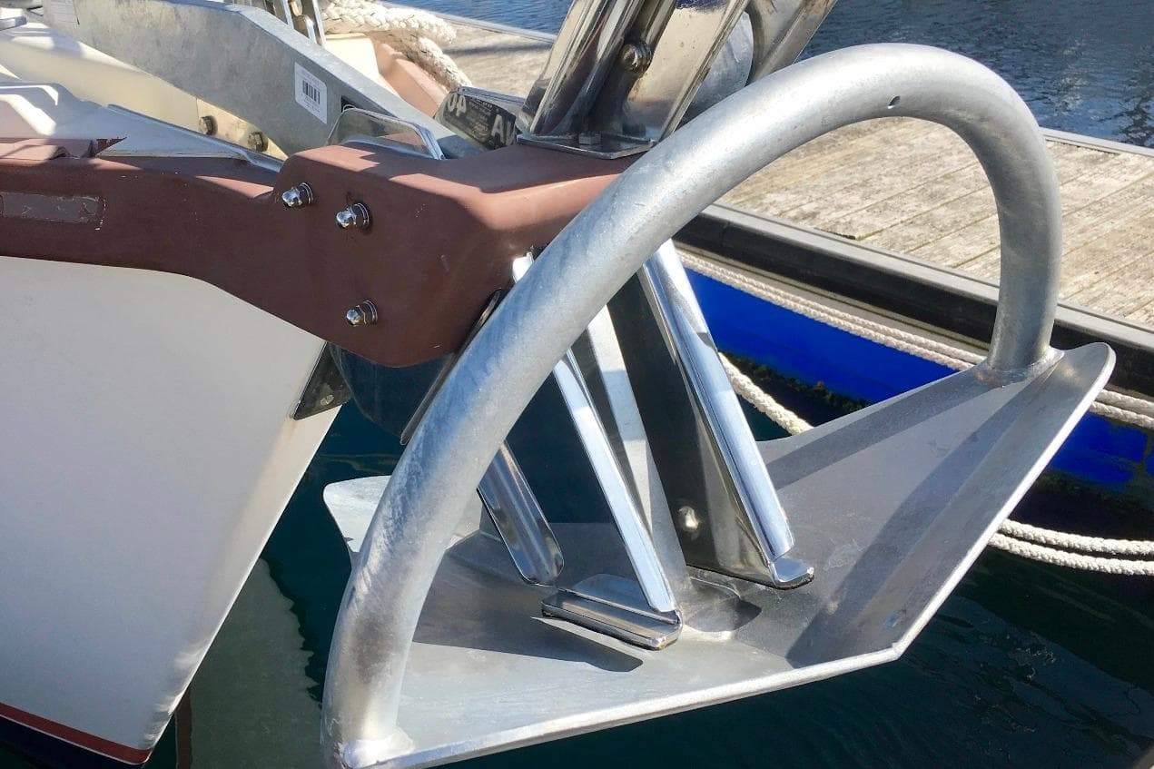 Anchor on 1993 Amel Santorin Sloop, docked at marina.