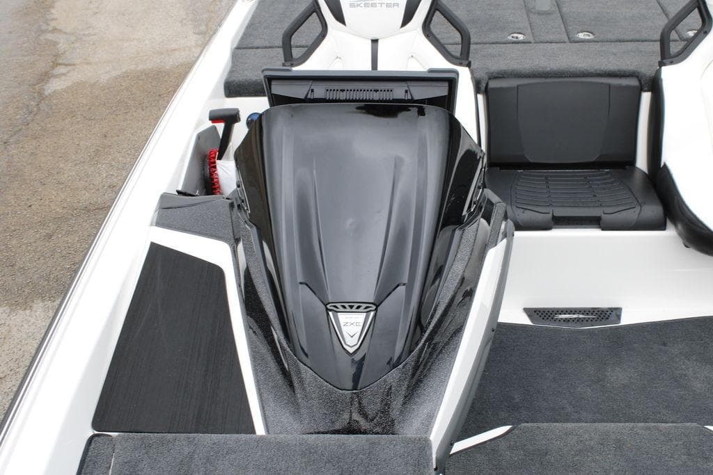 2026 Skeeter ZXE21 boat interior with sleek black console and seating.