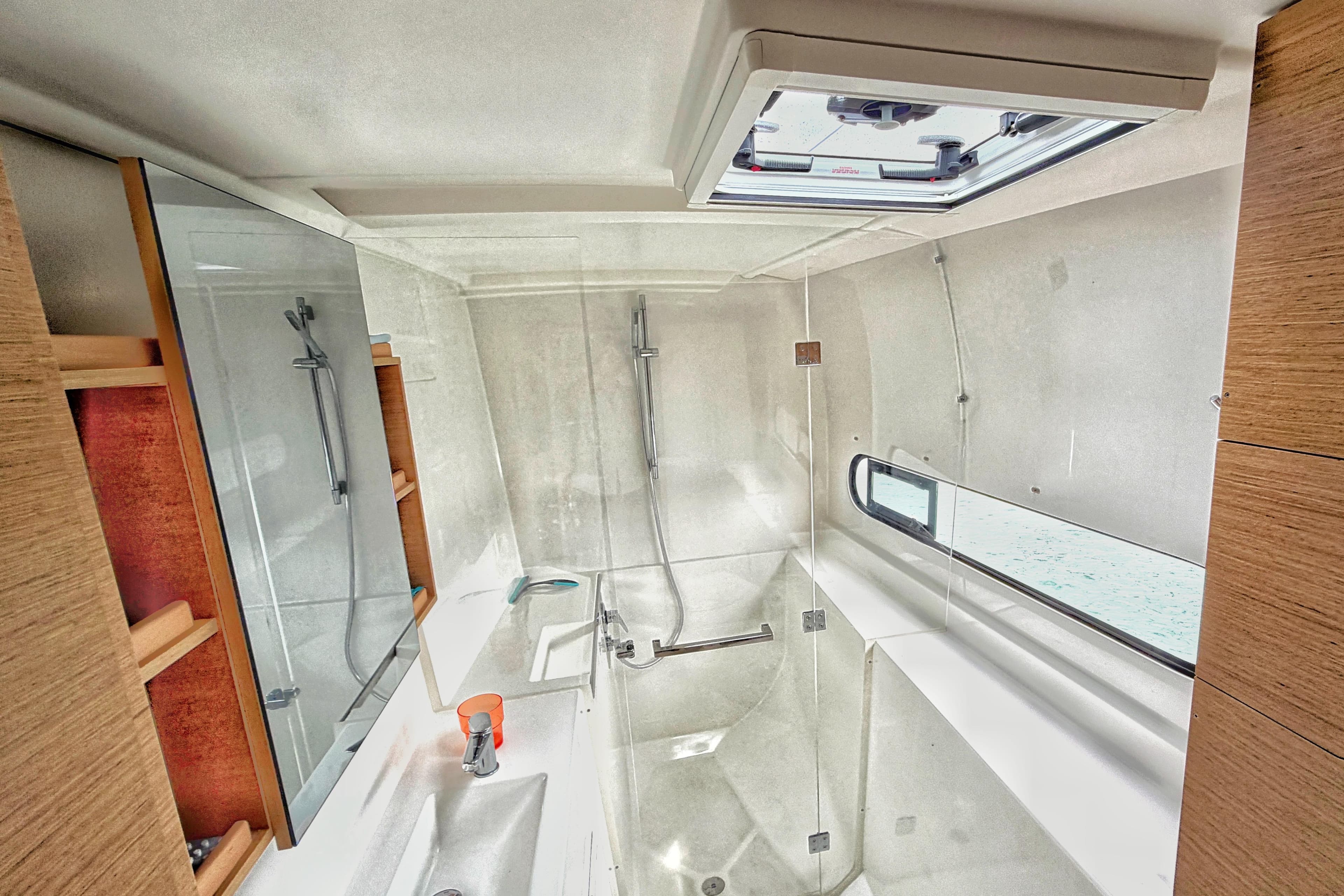 Modern bathroom interior of 2024 Excess 11 yacht with shower and sink.