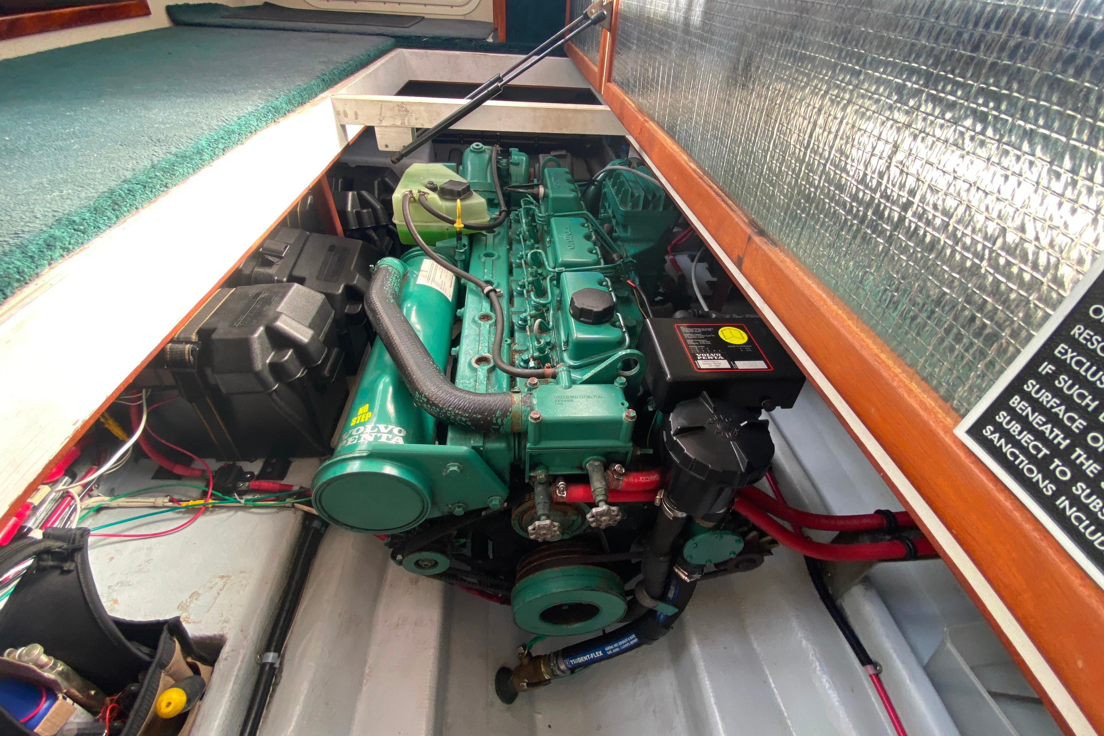 Engine compartment of a Camano 30 boat featuring a Volvo Penta engine.