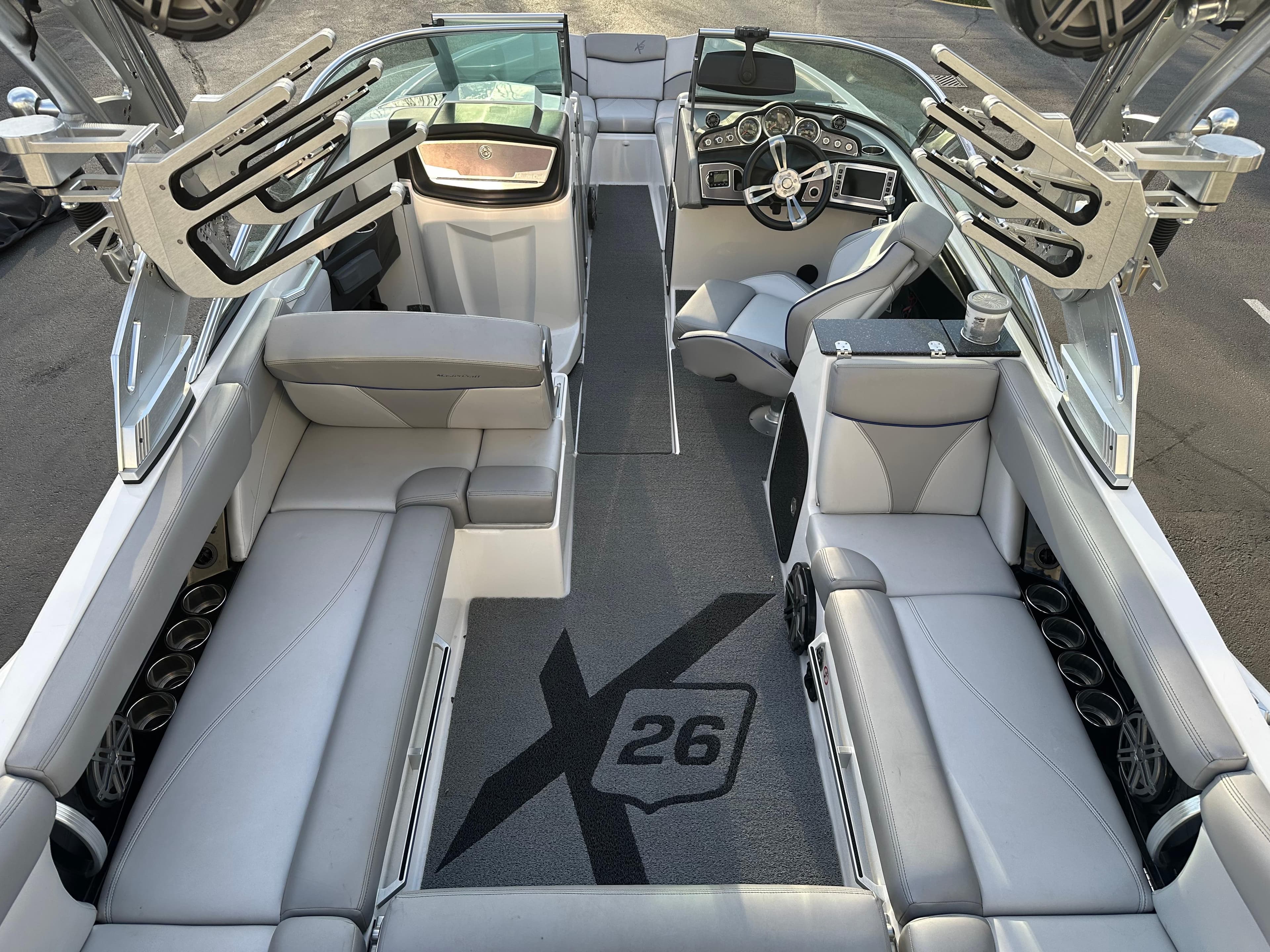 2017 MasterCraft X26 boat interior with luxurious seating and modern dashboard design.