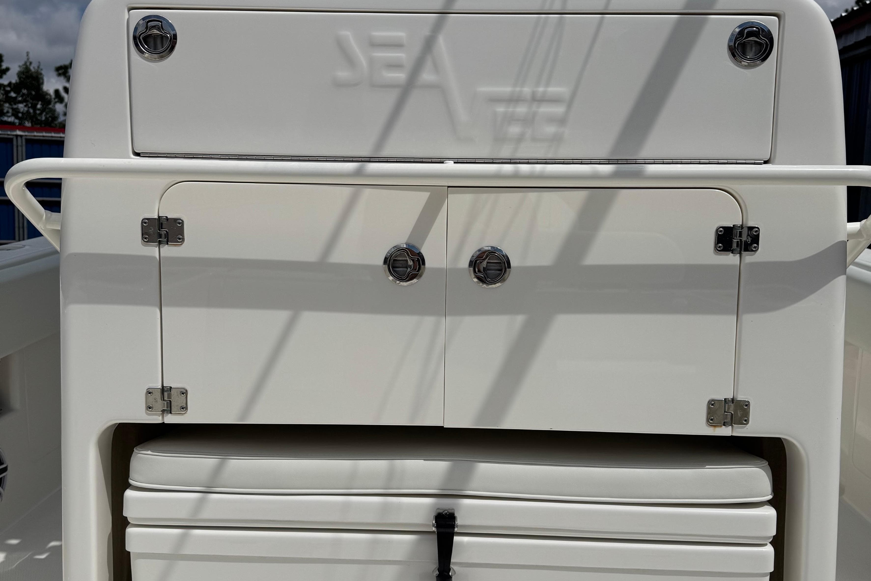 2024 SeaVee 32Z boat storage compartment with sleek white finish and secure latches.