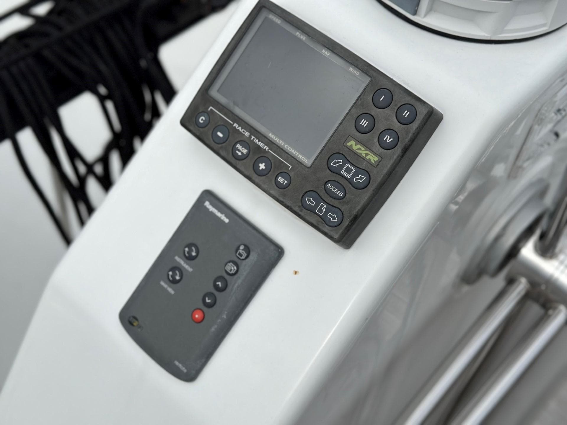 Control panel of a 2007 Beneteau First 44.7 sailboat, featuring navigation instruments.