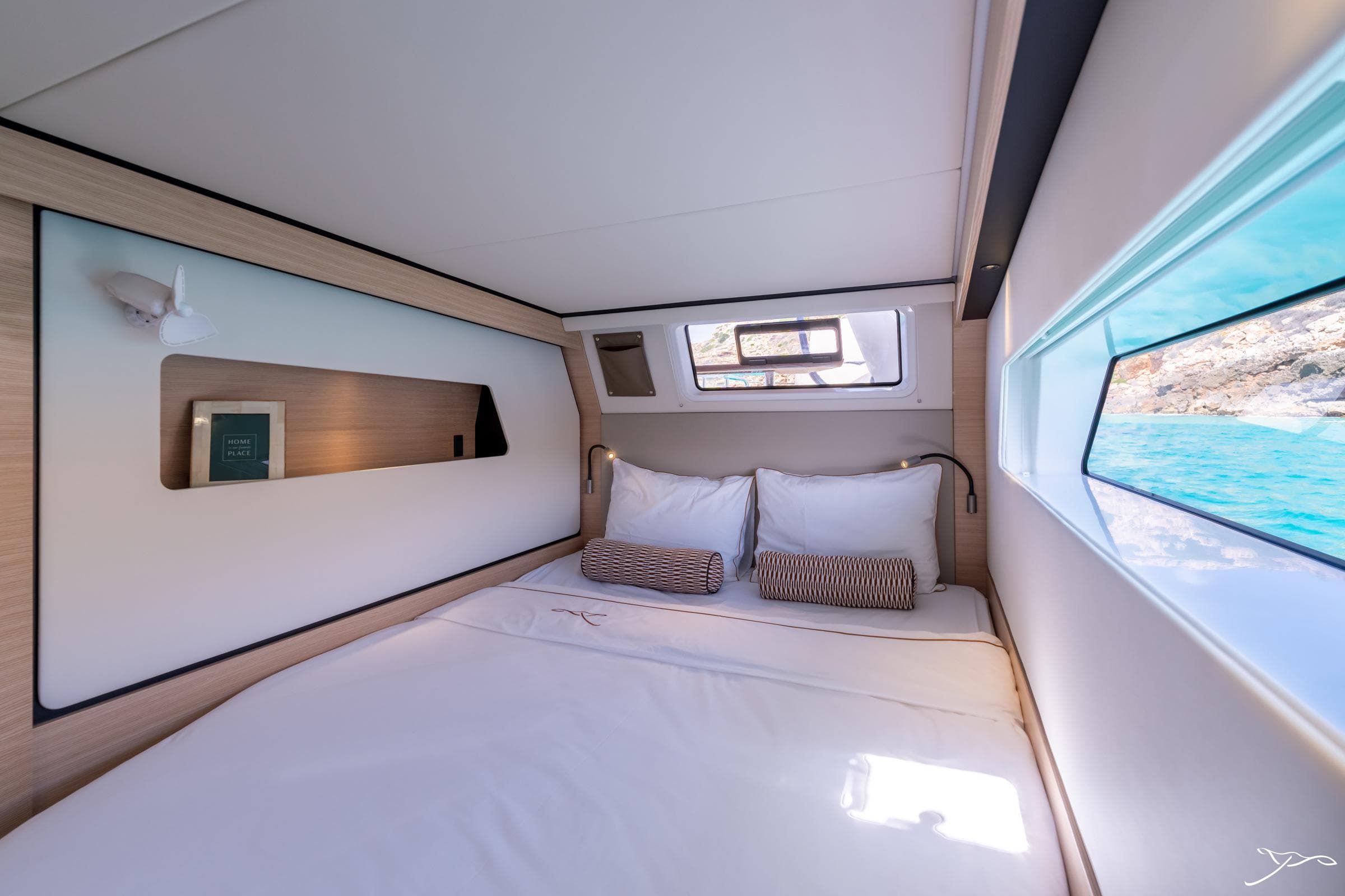 Luxurious cabin interior of 2025 Nautitech 44 Open yacht with scenic ocean view.