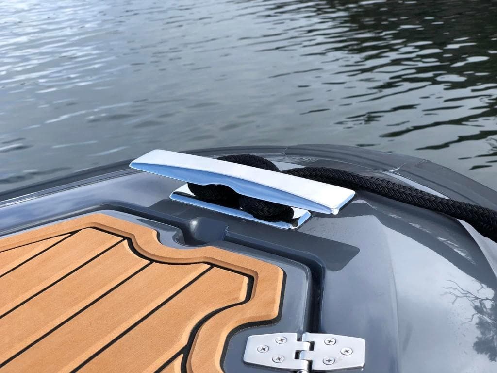 2024 Northstar Orion 6 boat deck with cleat and wooden flooring.