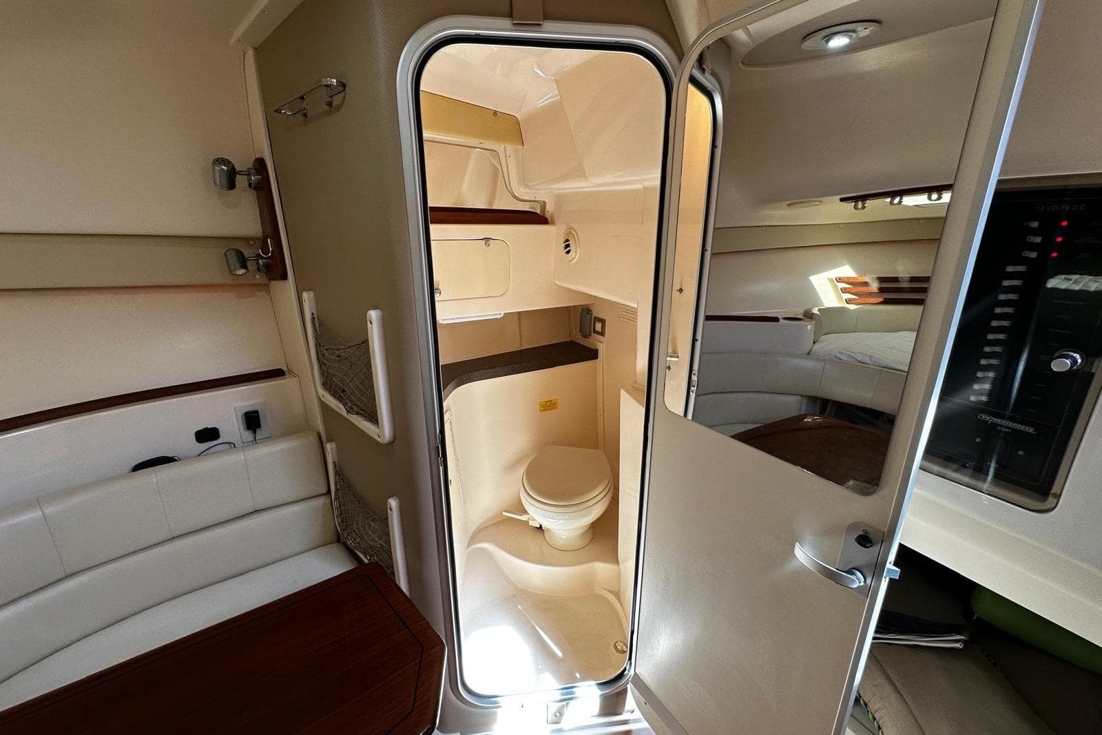 Interior of 2008 Grady-White Express 330 boat showing cabin and bathroom area.