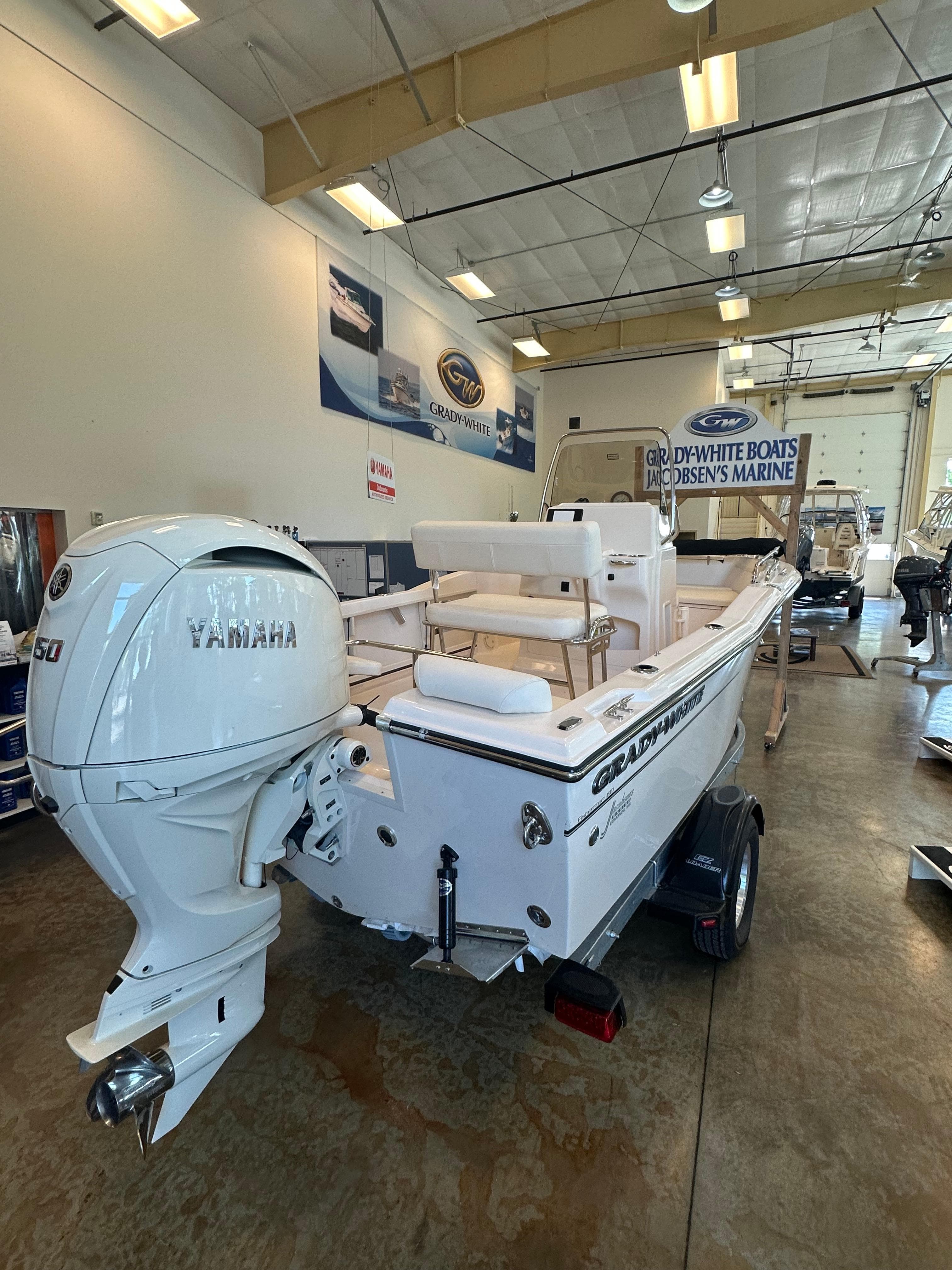 2025 Grady-White Fisherman 180 boat with Yamaha engine in showroom.