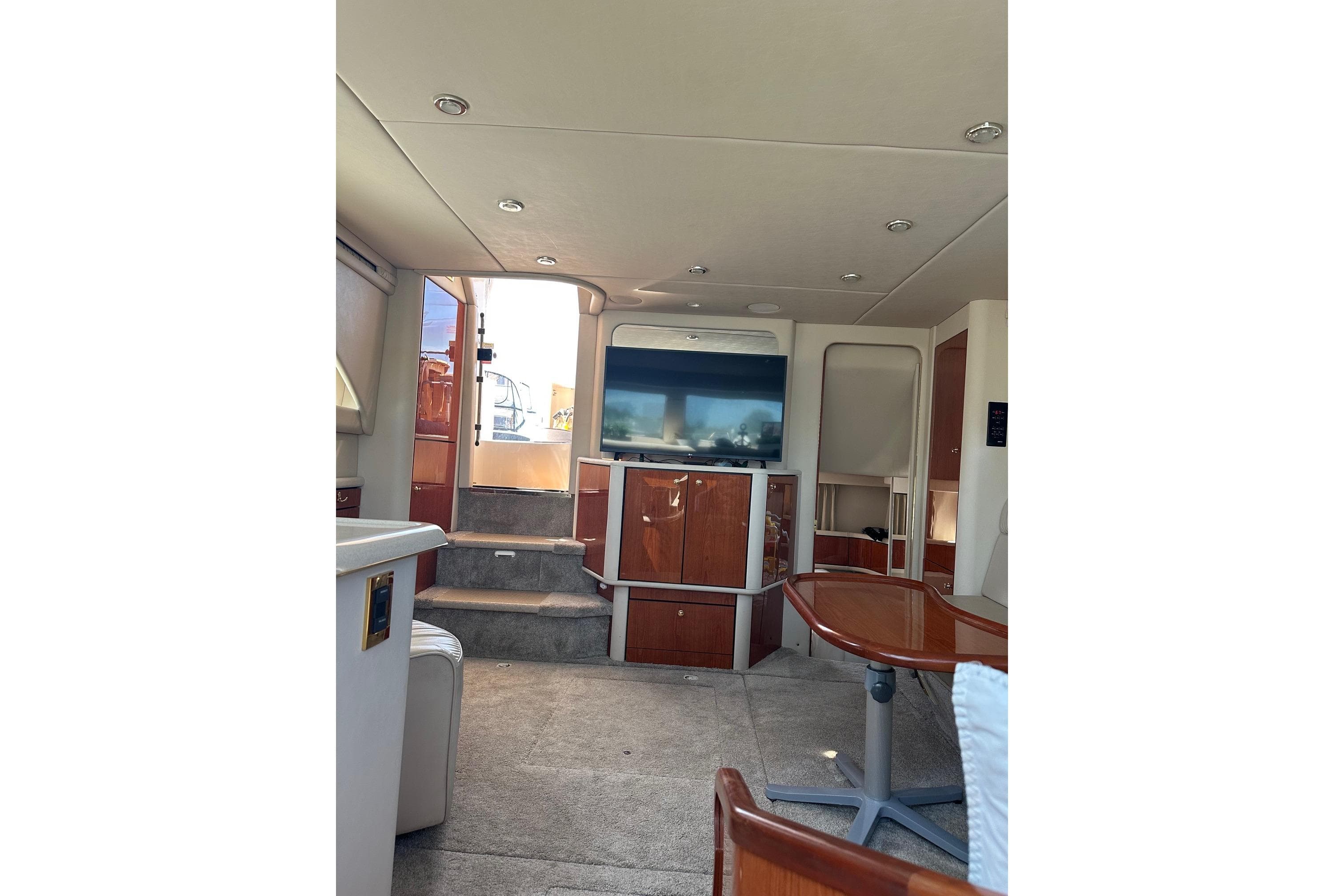 Interior of 2000 Sea Ray 380 Aft Cabin yacht with modern furnishings.