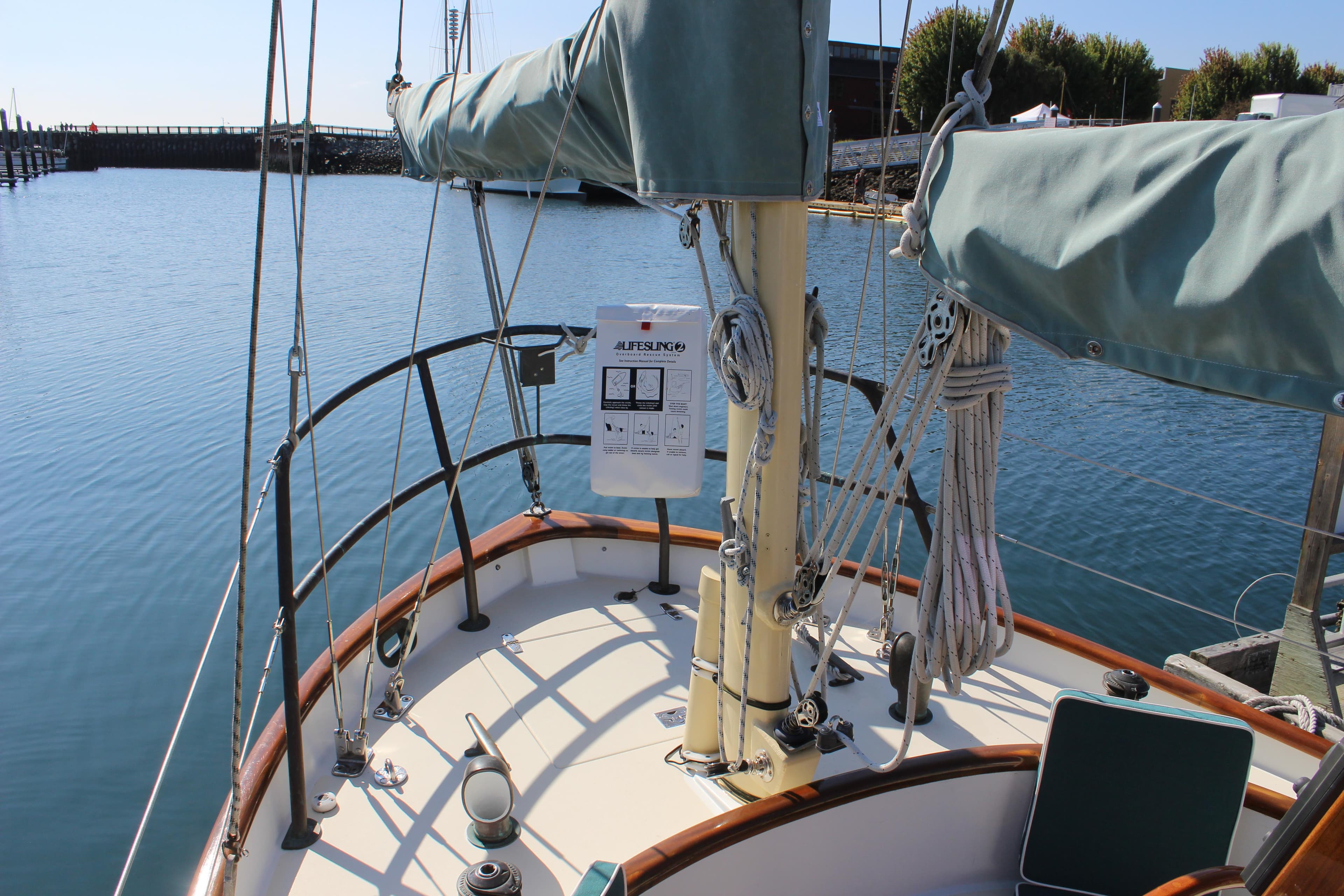 Sailboat deck view, Custom Gartside Jespersen 40, 2012, docked in calm waters.