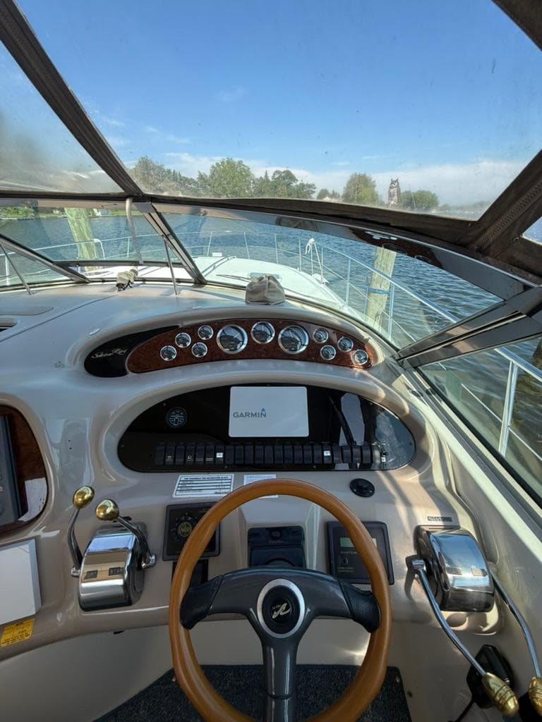 Cockpit view of 2000 Sea Ray 380 Sundancer with Garmin navigation system.