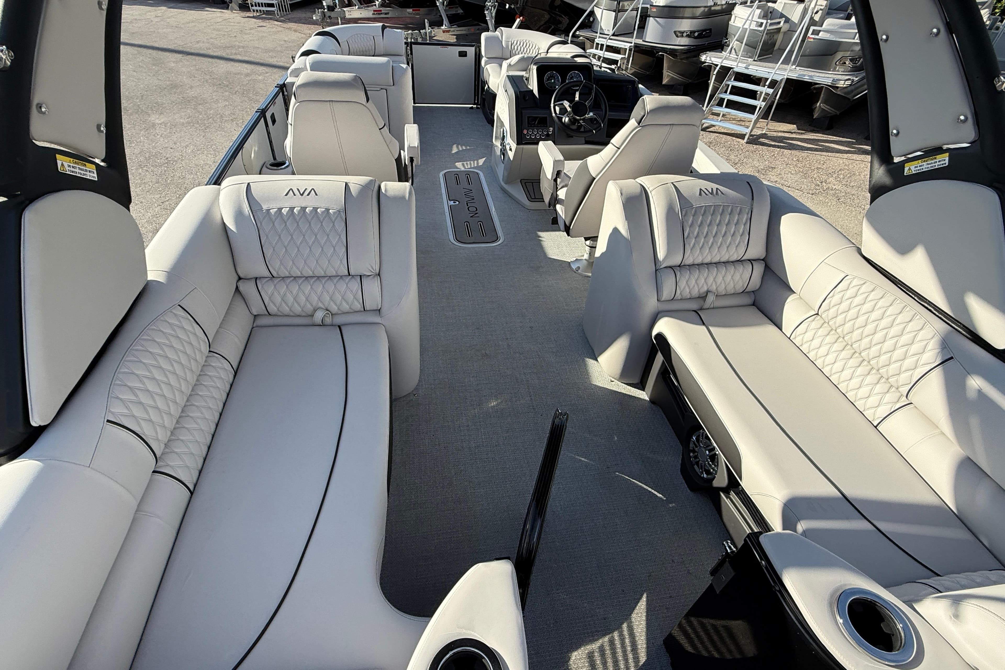 Luxurious interior of 2026 Avalon 2385 Catalina Quad Lounger, Tri Toon High Performance boat.