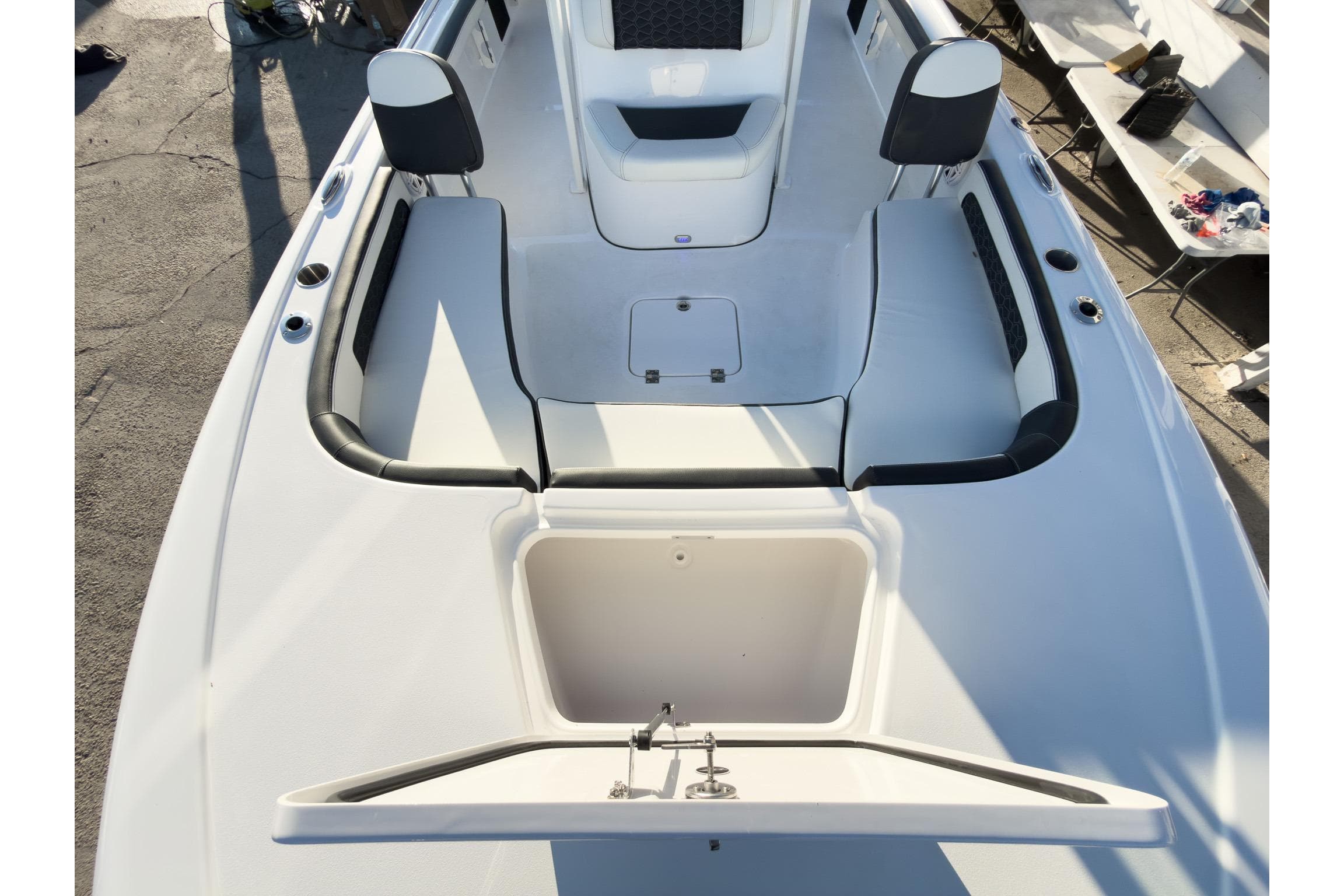 2026 Tidewater 2300 Carolina Bay boat interior with seating and storage compartments.