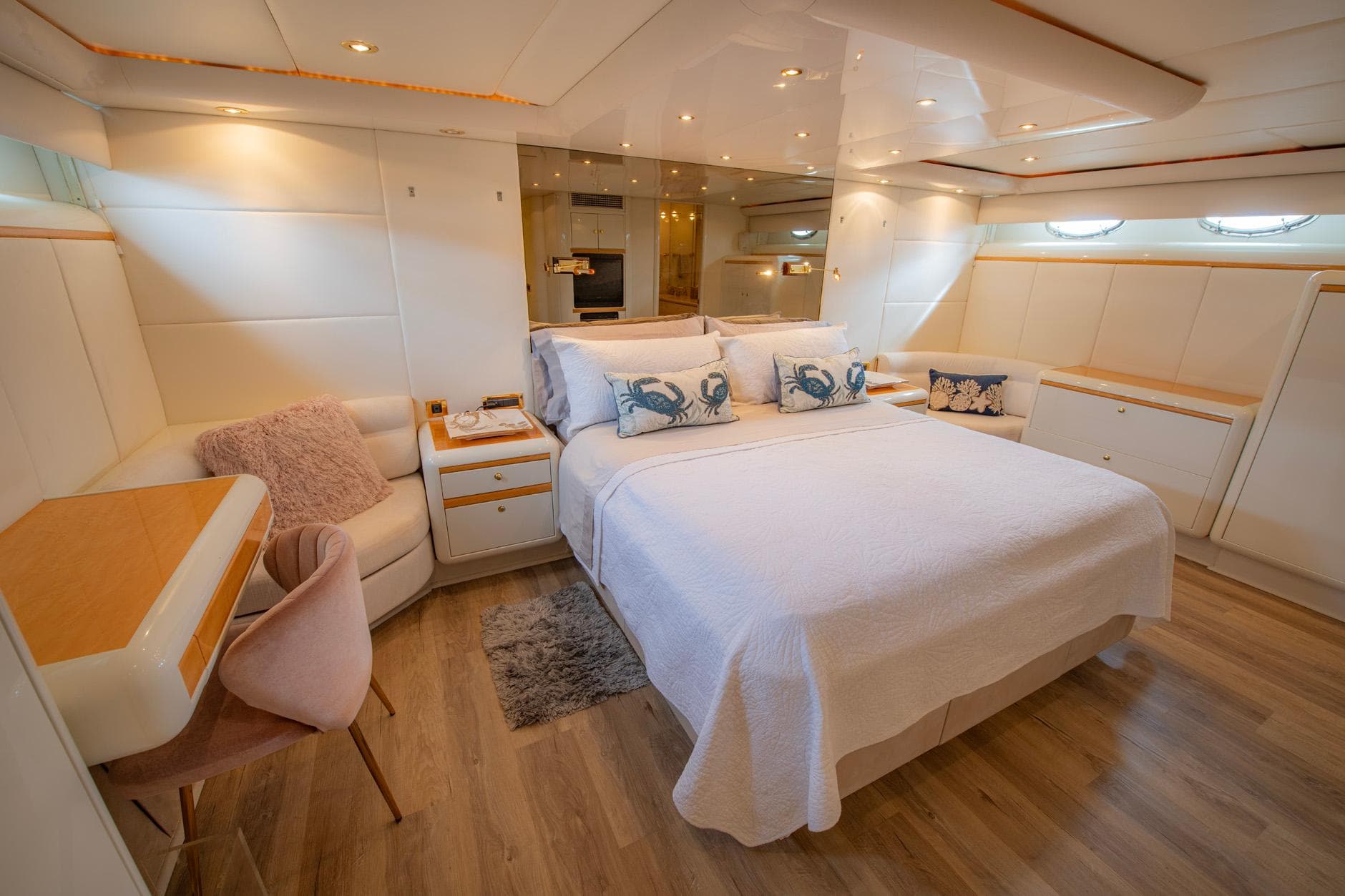 Luxurious 1997 Lazzara 76 Motor Yacht bedroom with elegant decor and modern furnishings.