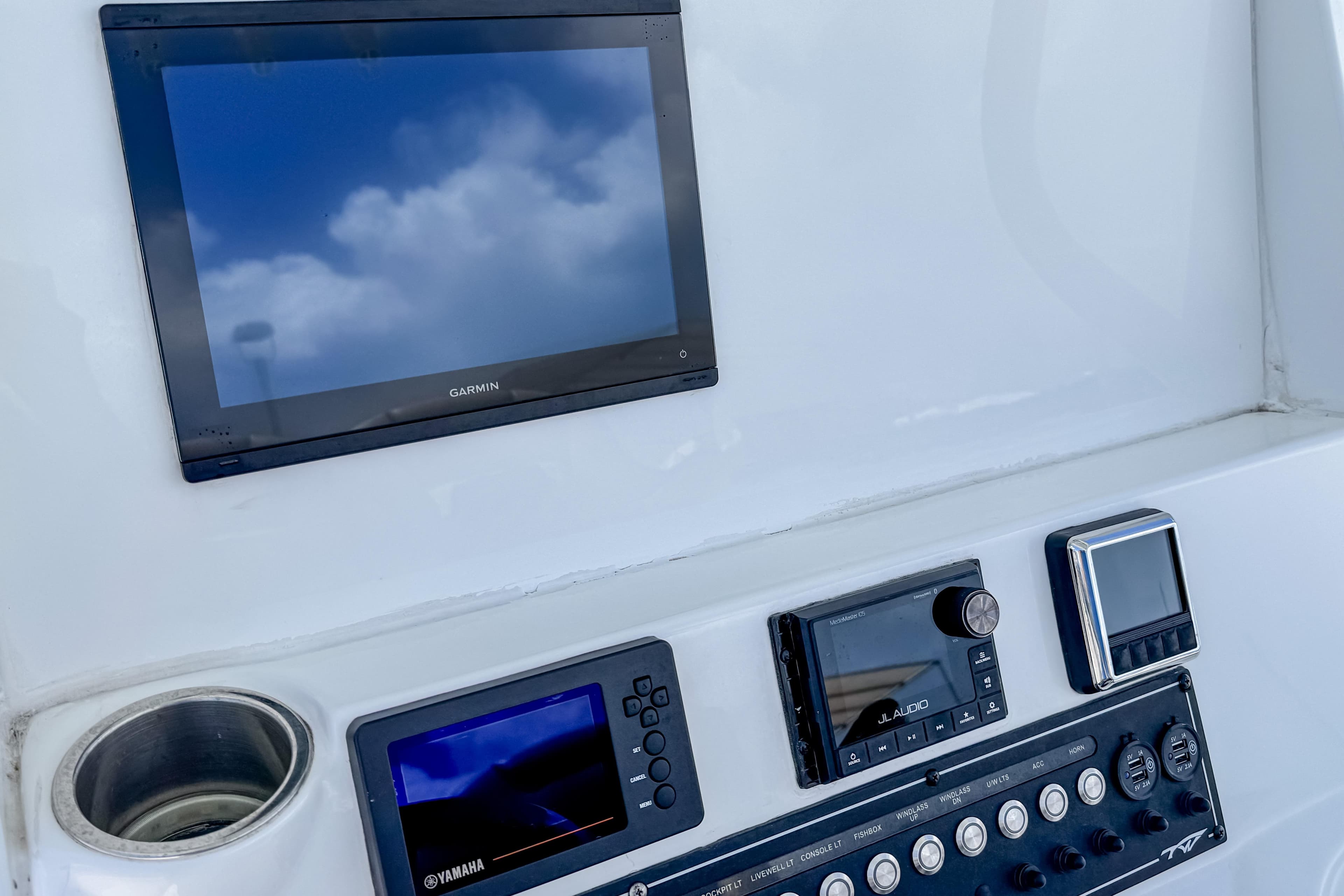 Dashboard of 2023 Tidewater 280 CC Adventure boat with Garmin and Yamaha displays.