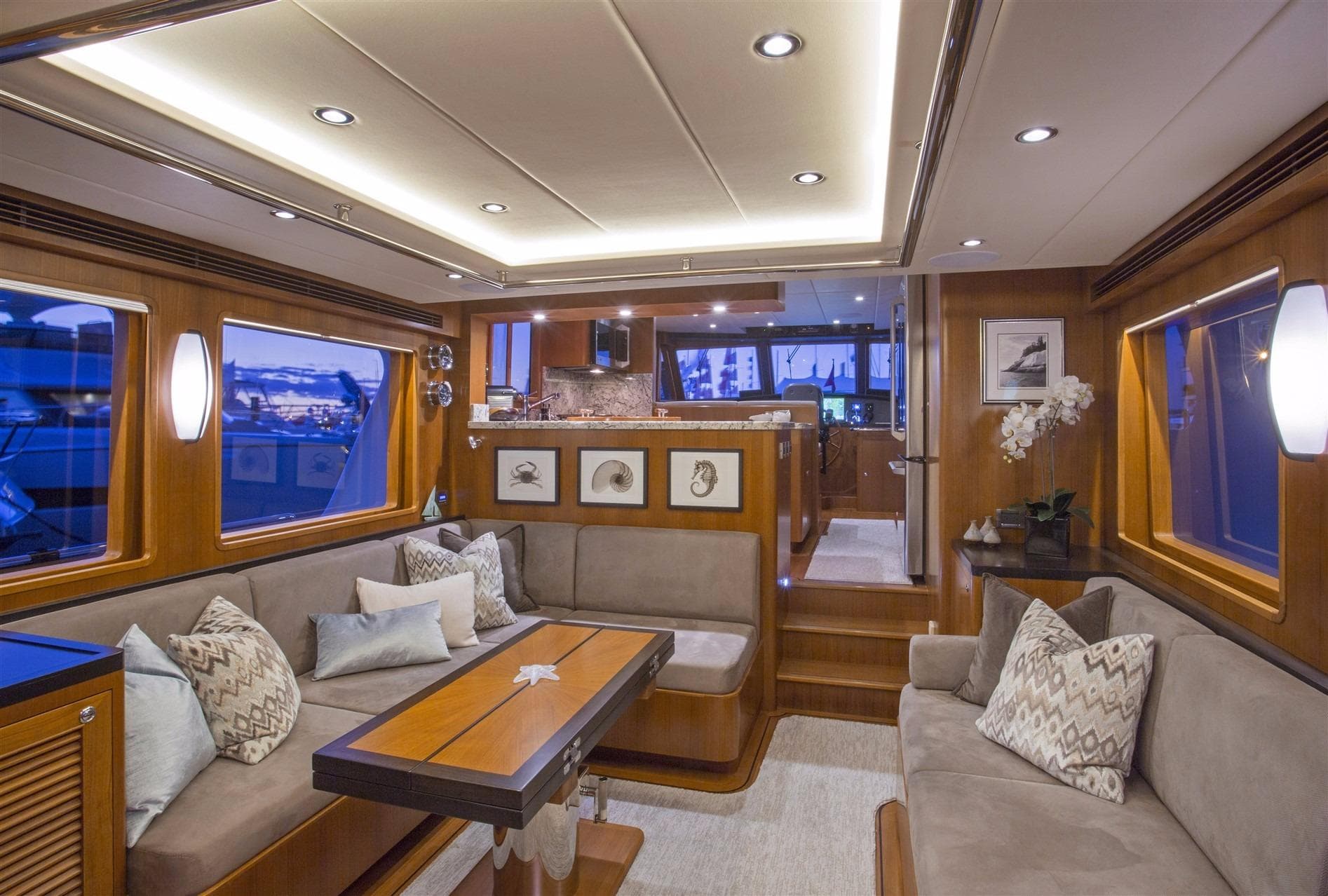 Luxurious interior of 2027 Outer Reef Yachts 580 Motoryacht with elegant seating and decor.