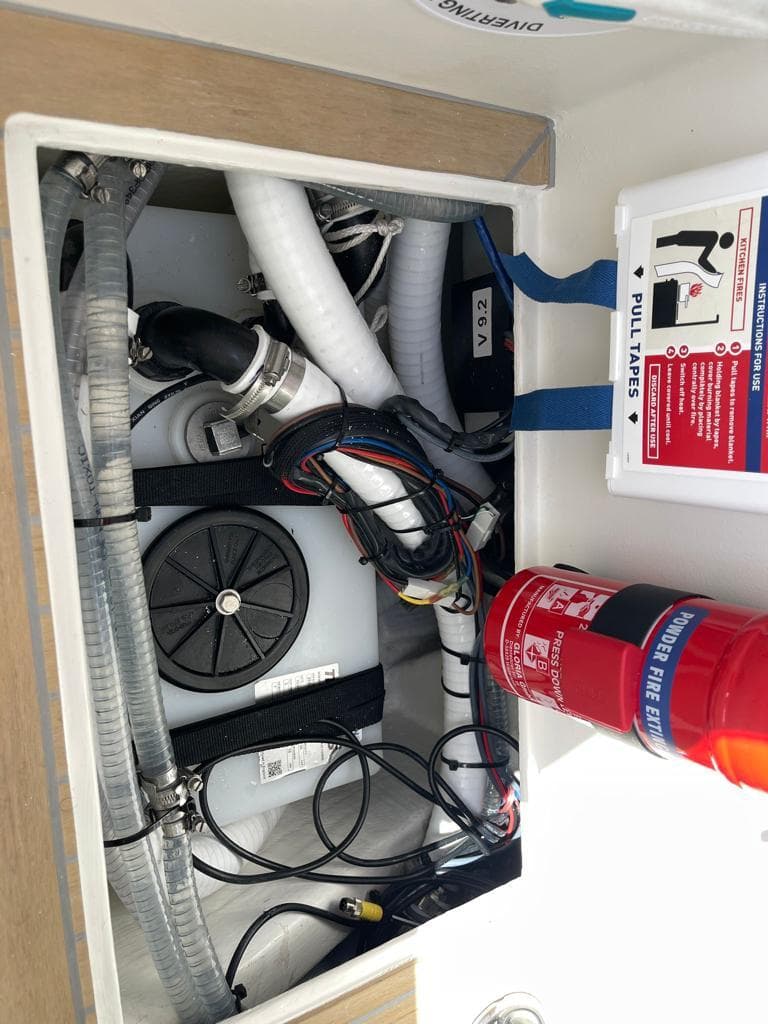 2022 Rib-X Chase RIB engine compartment with fire extinguisher and wiring.