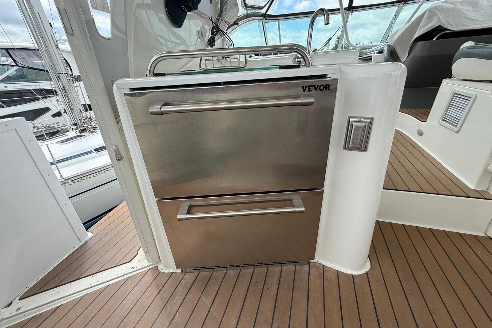 Stainless steel drawer unit on 2005 Cruisers Yachts 455 Express Motoryacht deck.