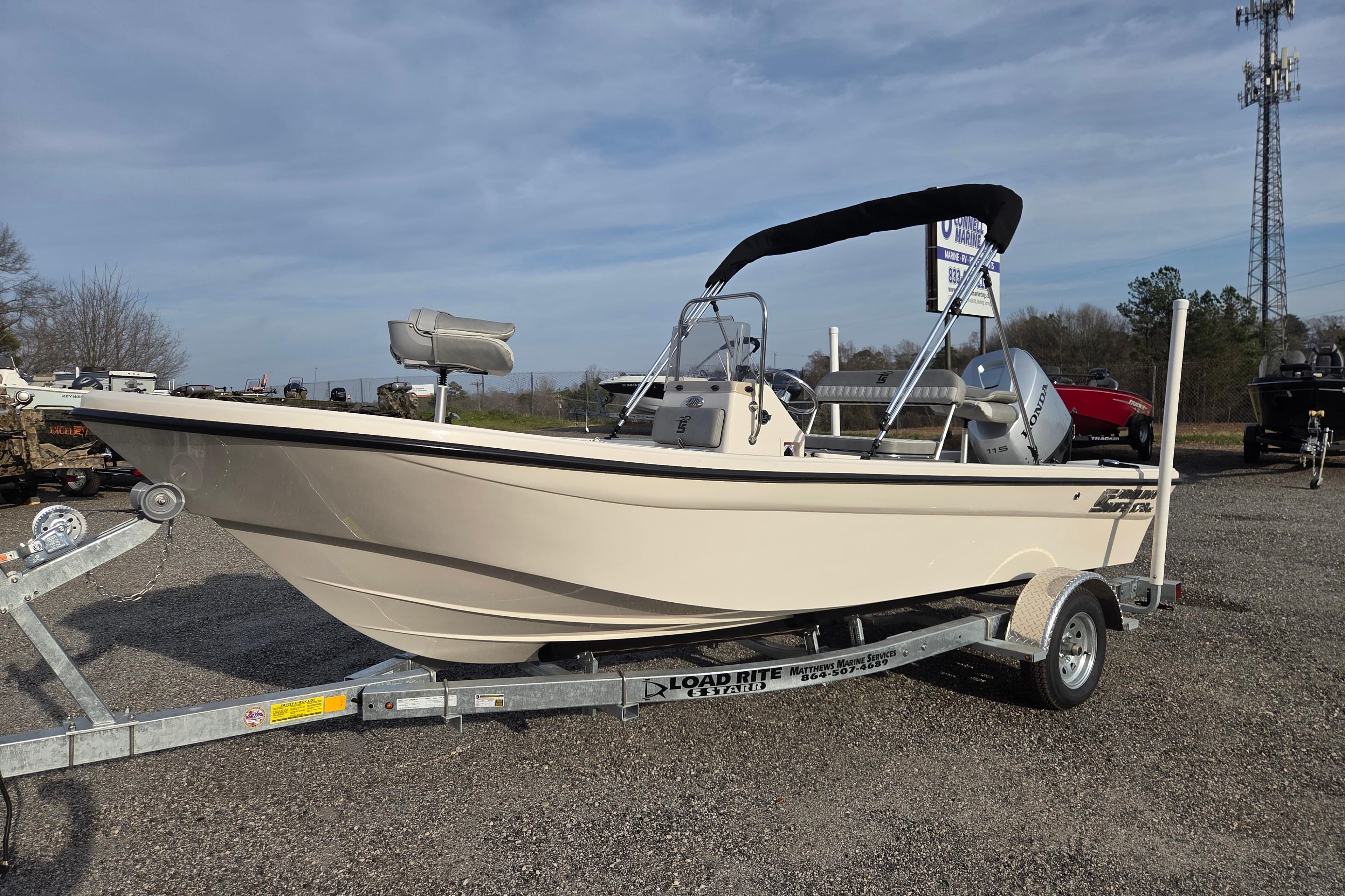 2026 Carolina Skiff 178 JLS boat on trailer, outdoor display.