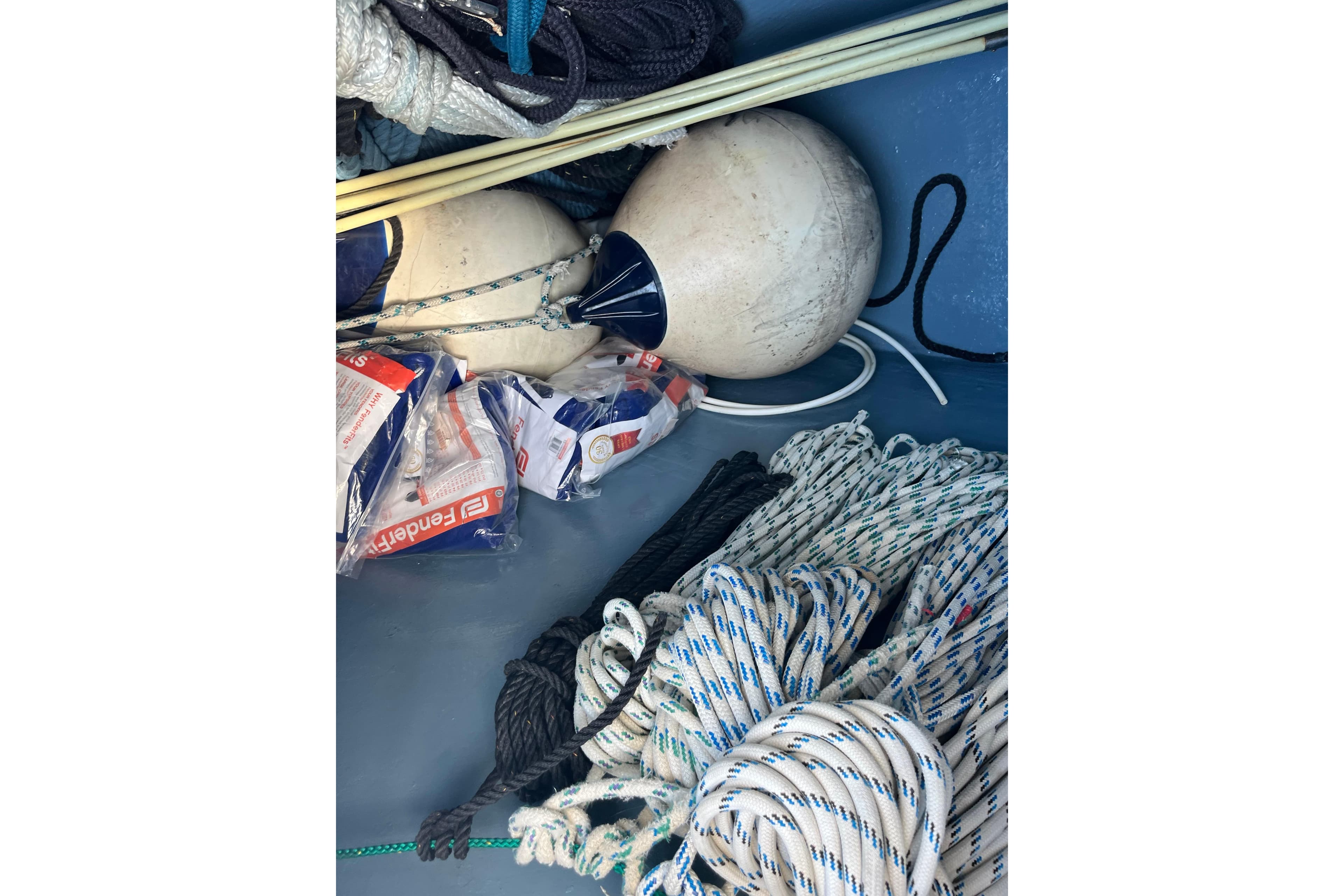 Ropes and buoys in storage on a 2004 Catana 471 Ocean Class Owner's Version.