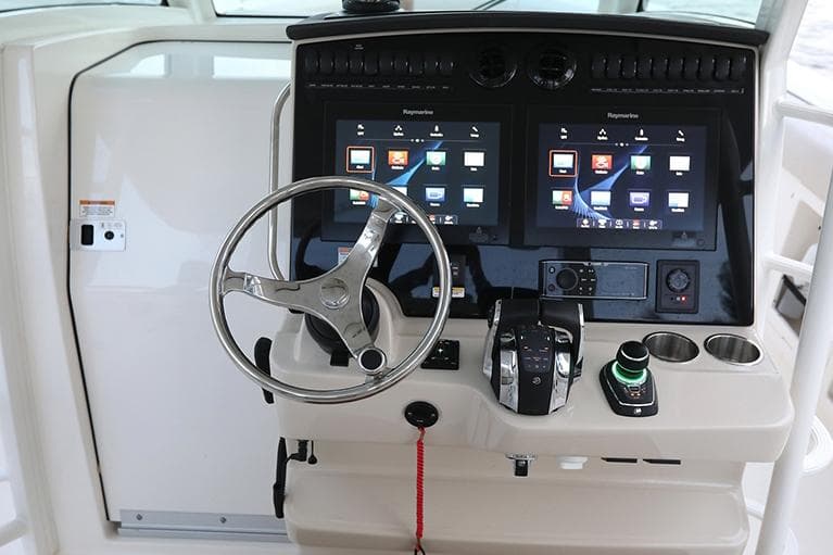 Manufacturer Provided Image: 2025 Boston Whaler 380 Outrage helm with dual touchscreen displays and modern controls.