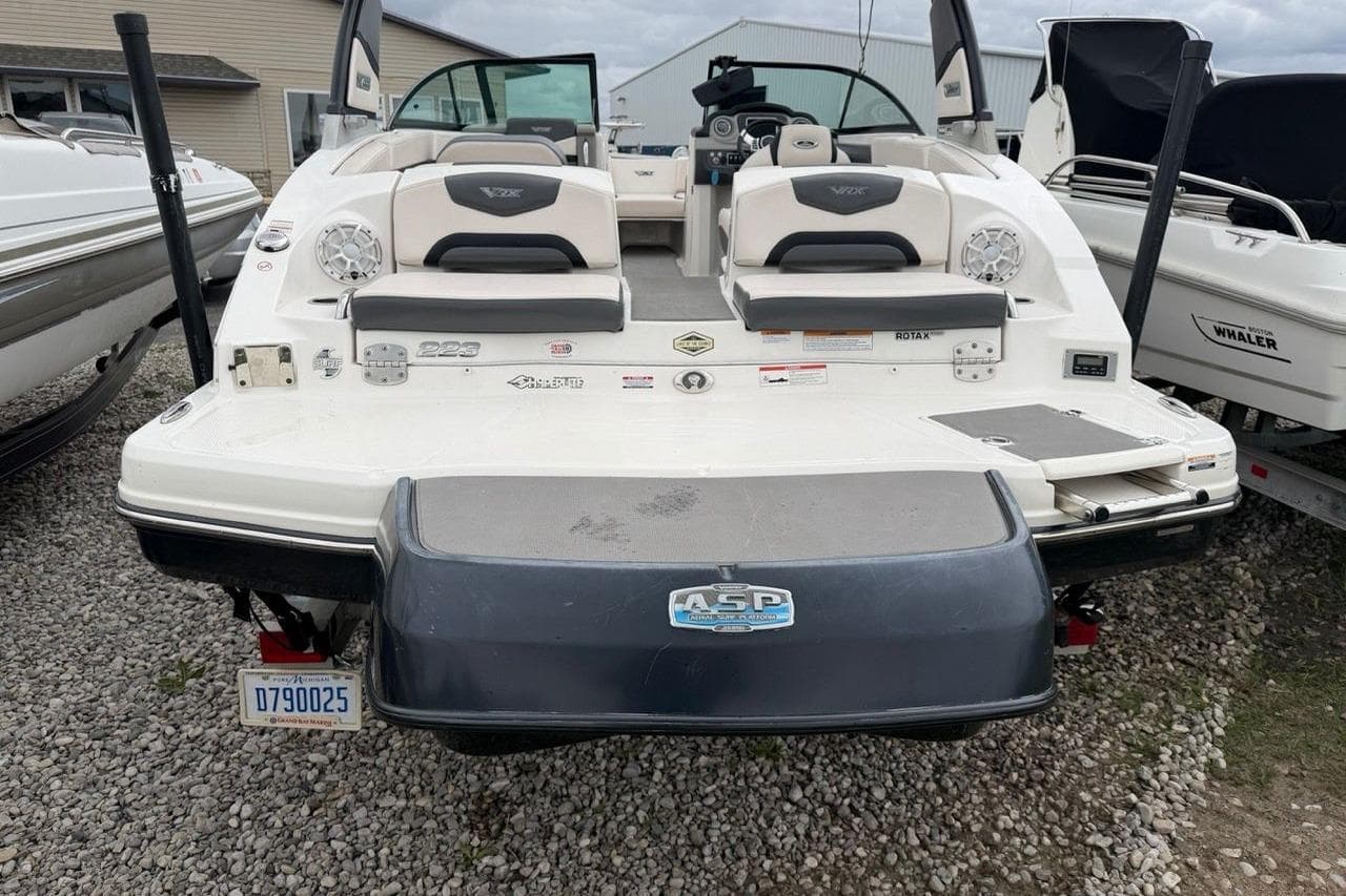 2018 Chaparral Vortex 223 VRX boat rear view, showcasing seating and swim platform.