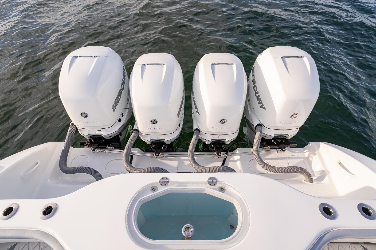 2022 Yellowfin 42 boat with four Mercury outboard engines on water.