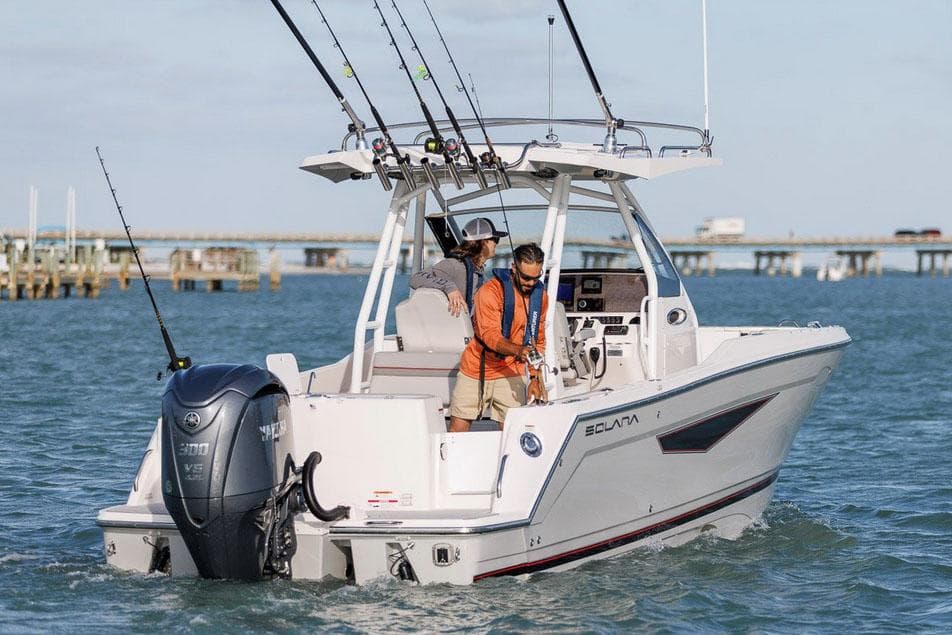 Manufacturer Provided Image: 2025 Solara S-250 CW boat on water, equipped for fishing, with two people onboard.