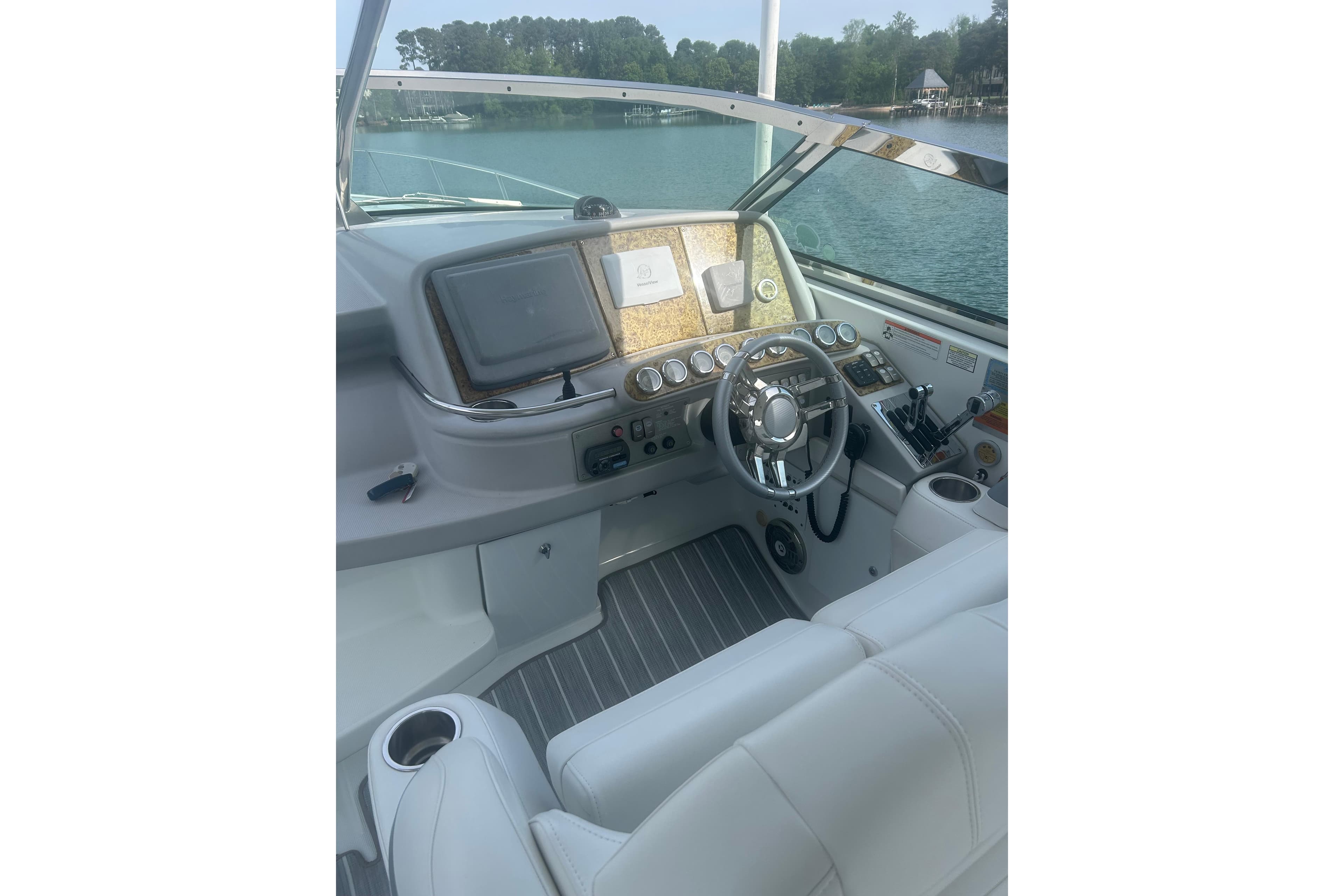 Cockpit of 2008 Formula 400 Super Sport boat with steering wheel and navigation controls.