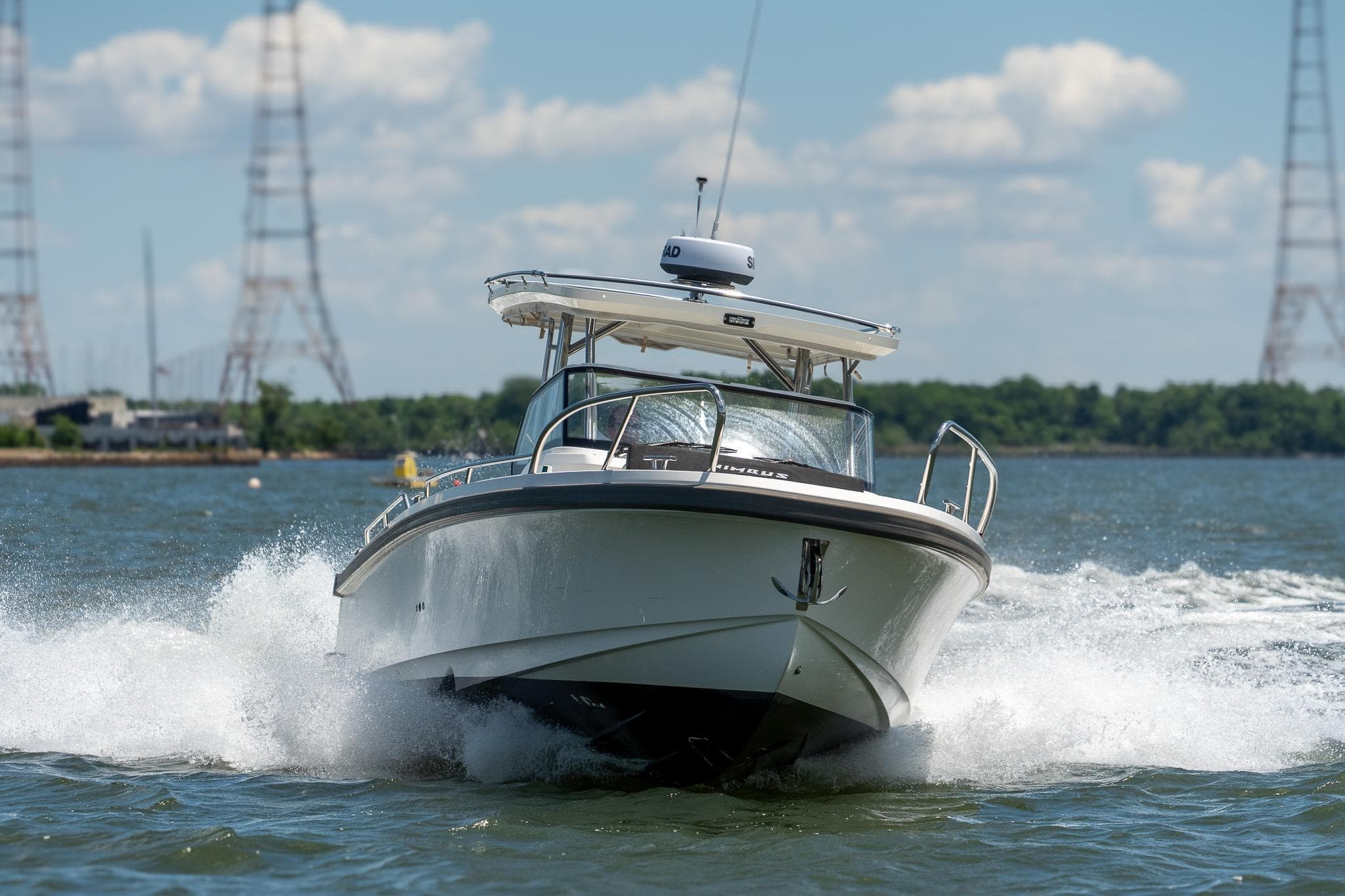 Nimbus Tender 9 boat 2023 cruising on water at high speed.
