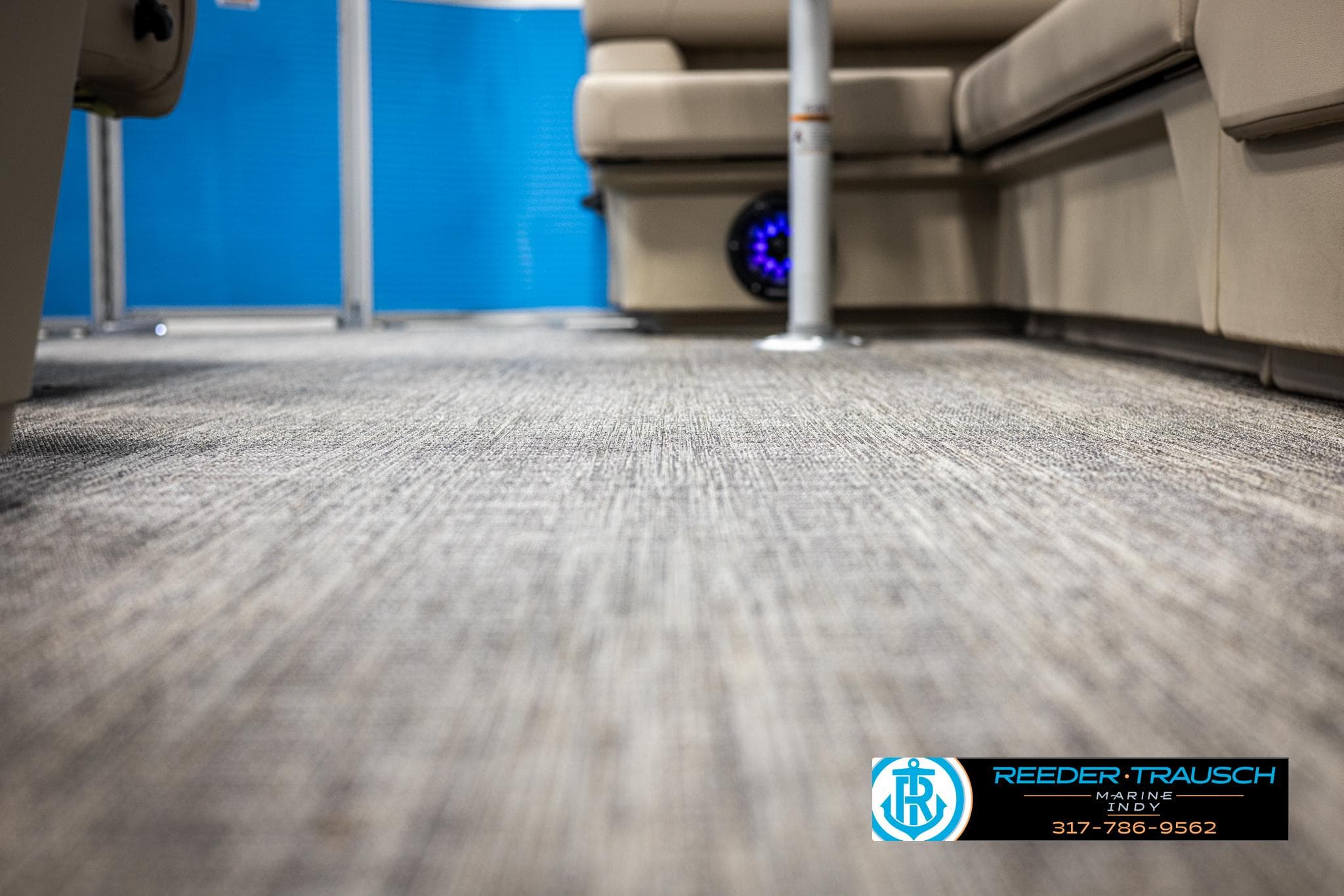 Interior of 2025 Bennington 20 SL with carpet flooring.